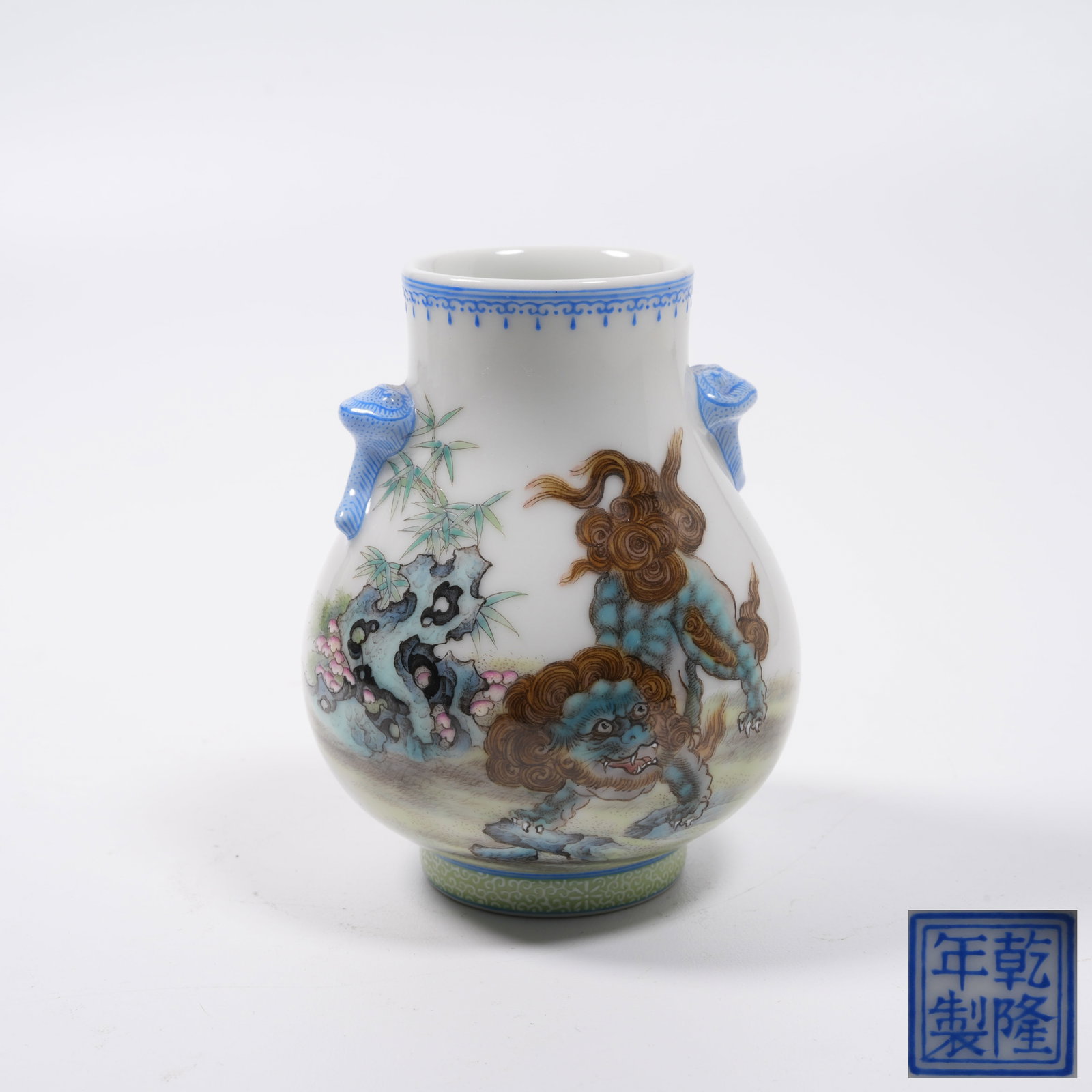 A FAMILLE ROSE ZUN VASE WITH GANODERMA EARS AND AUSPICIOUS LION PATTERN: Famille Rose Zun Vase with Ganoderma Ears and Auspicious Lion Pattern
