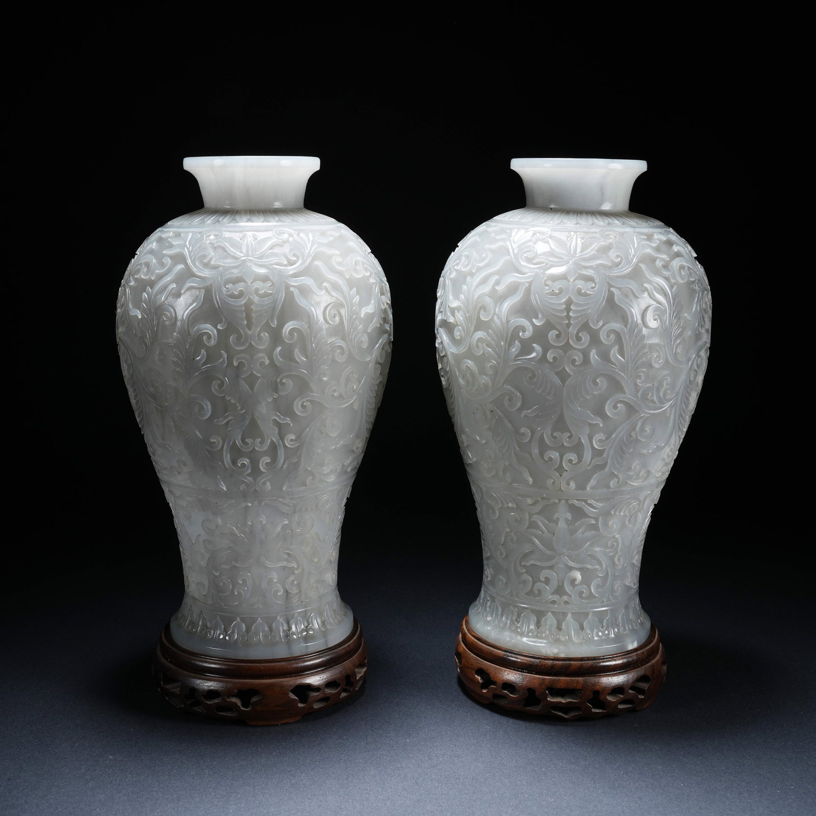 A SET OF HETIAN JADE PLUM VASES WITH FLORAL AND GRASS PATTERNS (1 of 10)