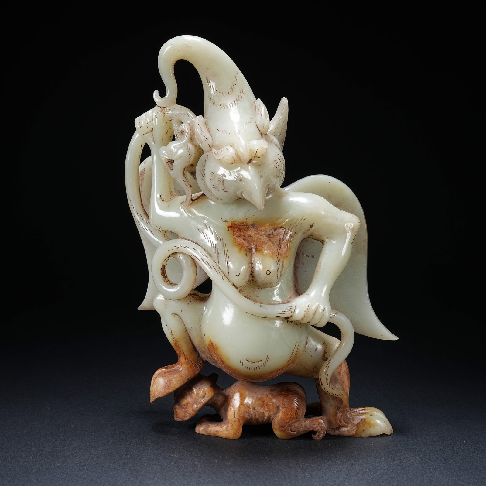 A ANCIENT JADE GOLDEN-WINGED ROC ORNAMENT: Ancient Jade Golden-winged Roc Ornament