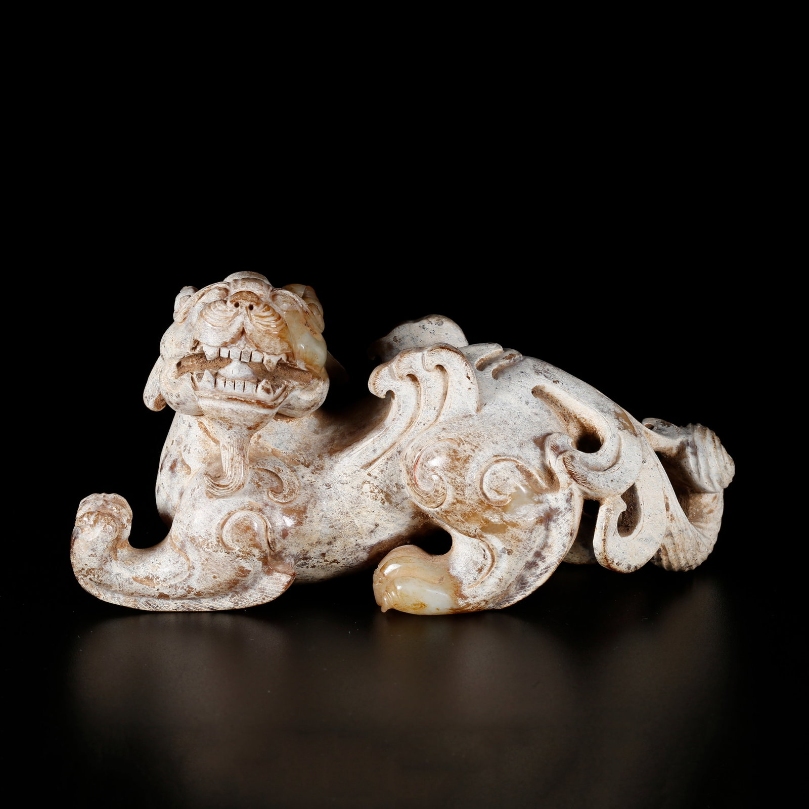 A ARCHAIC JADE ORNAMENT CARVED WITH CHILONG (1 of 9)