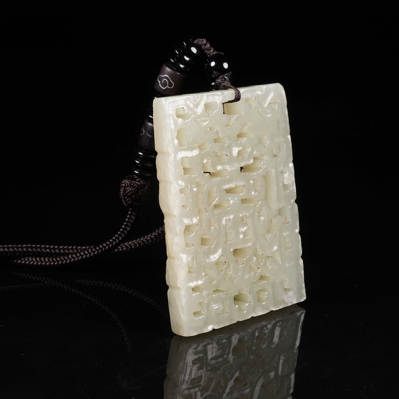 A NEPHRITE PLAQUE WITH LONGEVITY PATTERN - 4