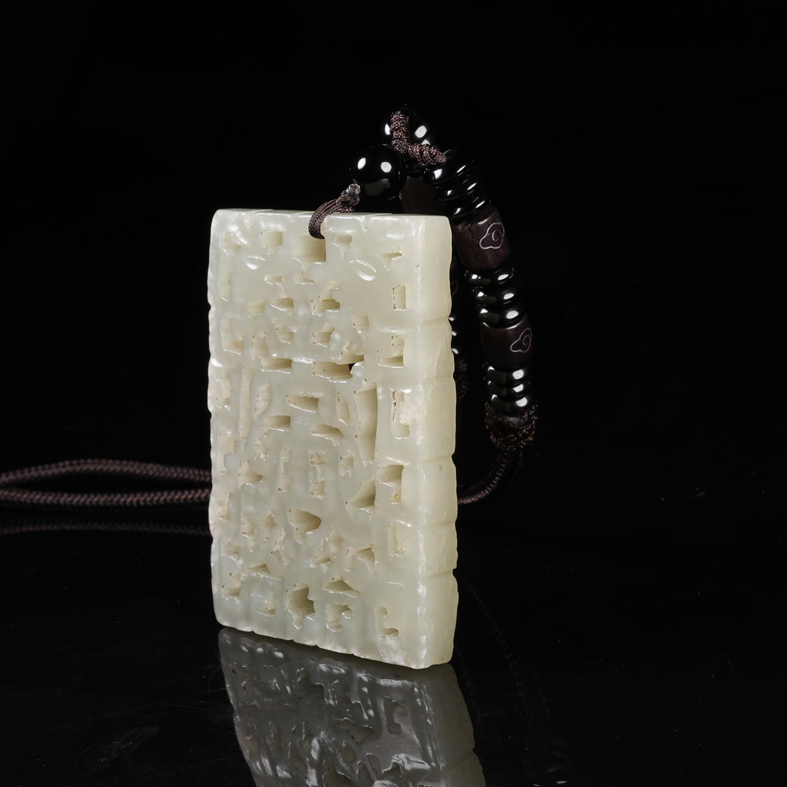 A NEPHRITE PLAQUE WITH LONGEVITY PATTERN - 5
