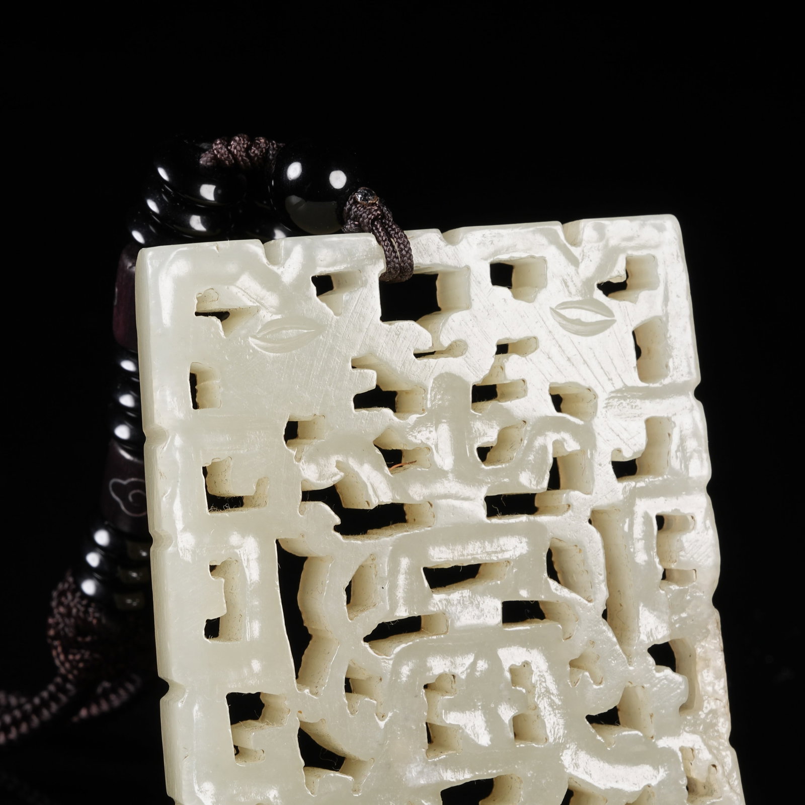 A NEPHRITE PLAQUE WITH LONGEVITY PATTERN - 6