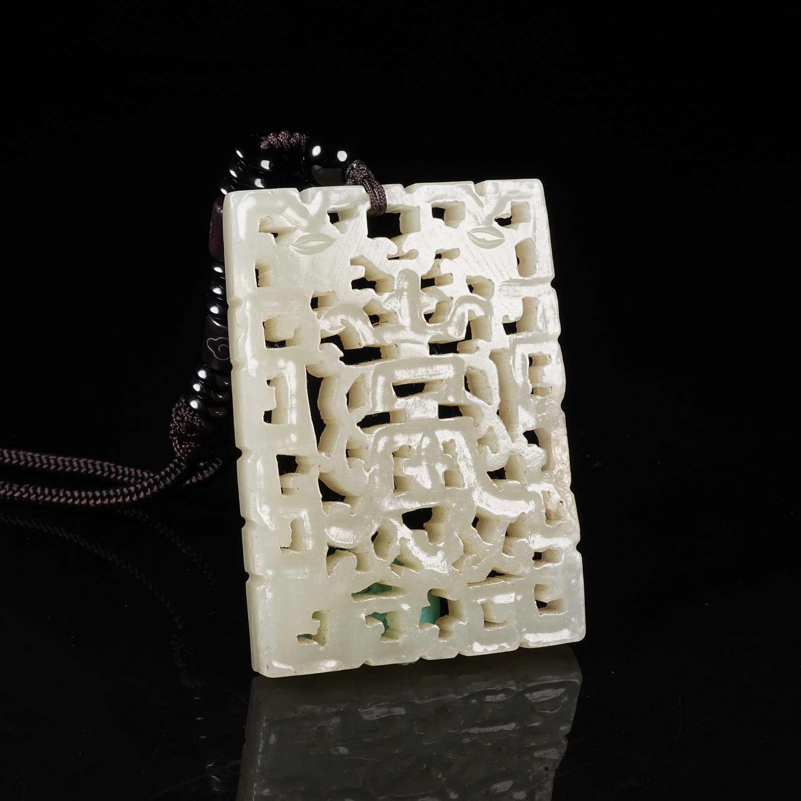 A NEPHRITE PLAQUE WITH LONGEVITY PATTERN - 7