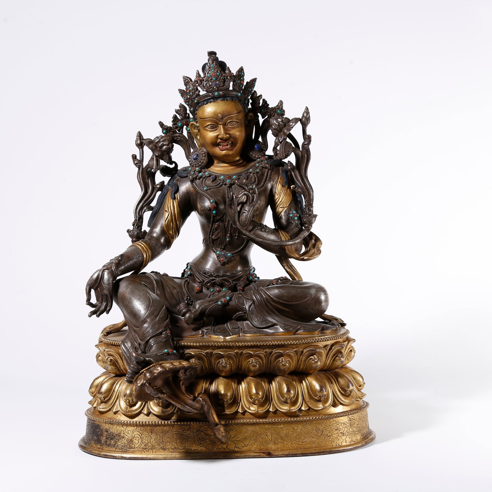 A GILT BRONZE SILVER-INLAID GREEN TARA STATUE (1 of 9)