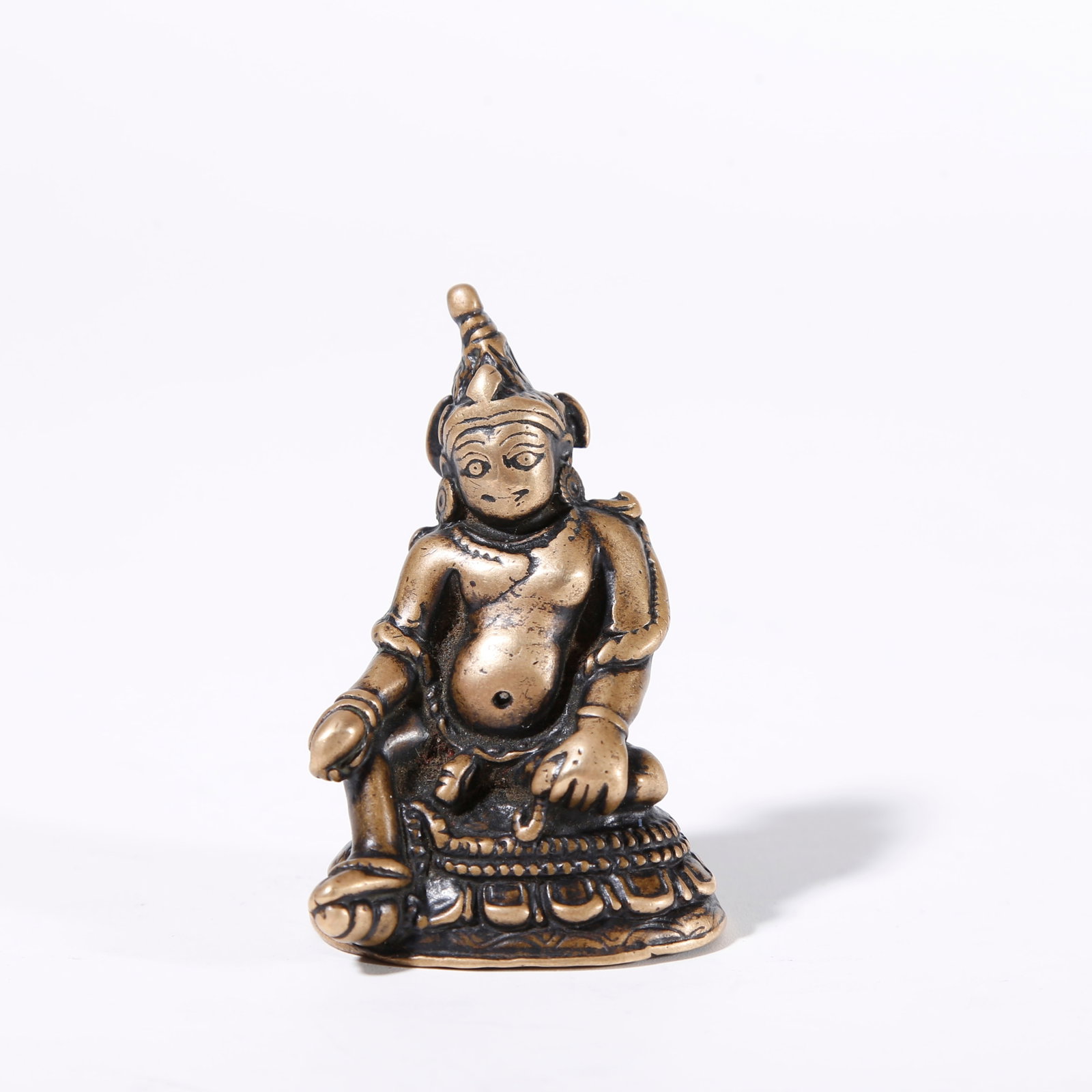 A BRONZE STATUE OF YELLOW JAMBHALA: Bronze Statue of Yellow Jambhala