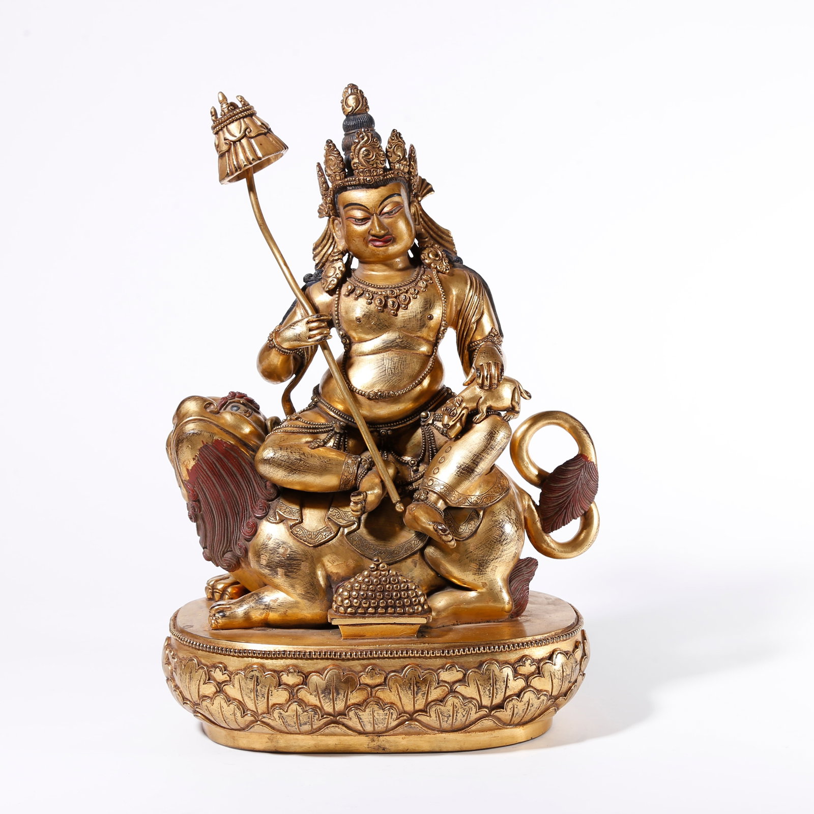 A GILT BRONZE STATUE OF VAISHRAVANA: Gilt Bronze Statue of Vaishravana