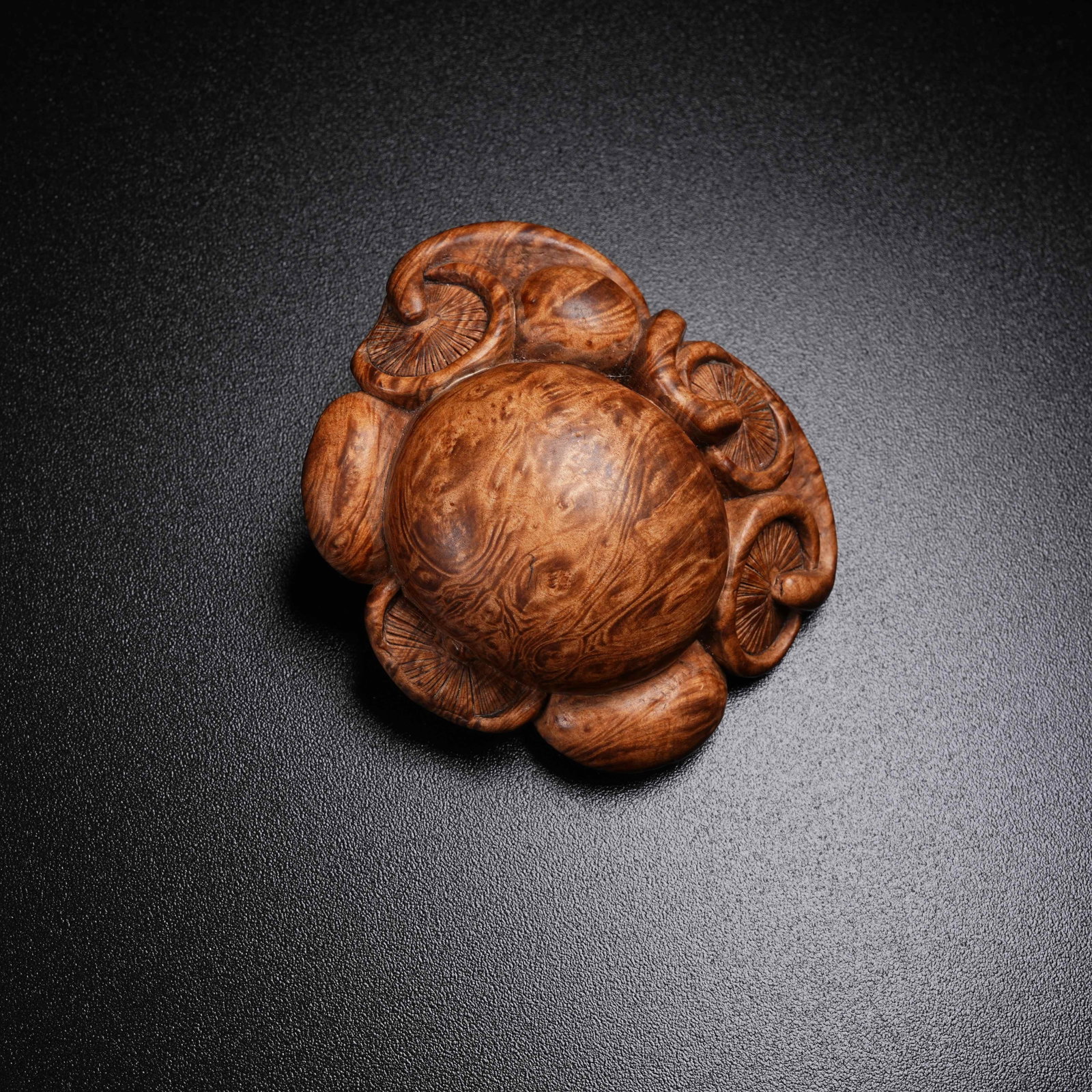 A BURL WOOD NINE GENTLEMEN PENDANT: Burl Wood Nine Gentlemen Pendant