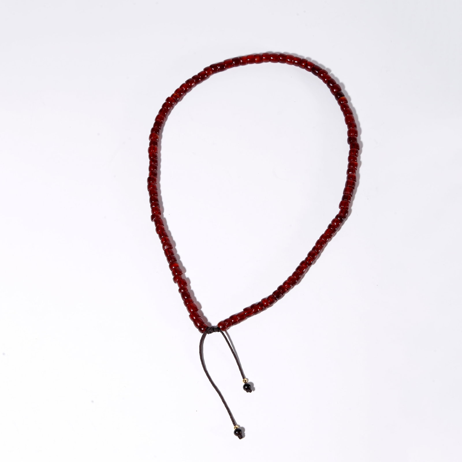 A CARVED SOUTHERN RED AGATE PENDANT: Carved Southern Red Agate Pendant