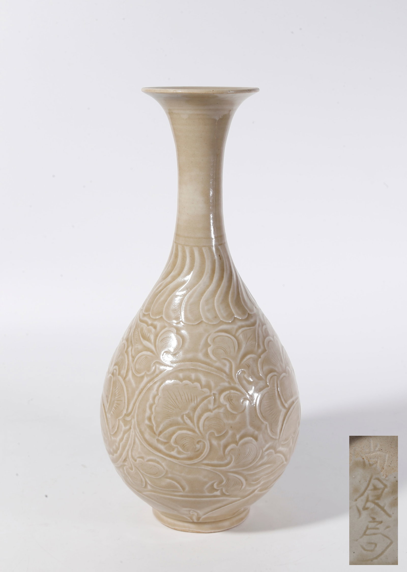 A DING KILN PEAR-SHAPED VASE WITH FLORAL PATTERNS: Ding Kiln Pear-shaped Vase with Floral Patterns