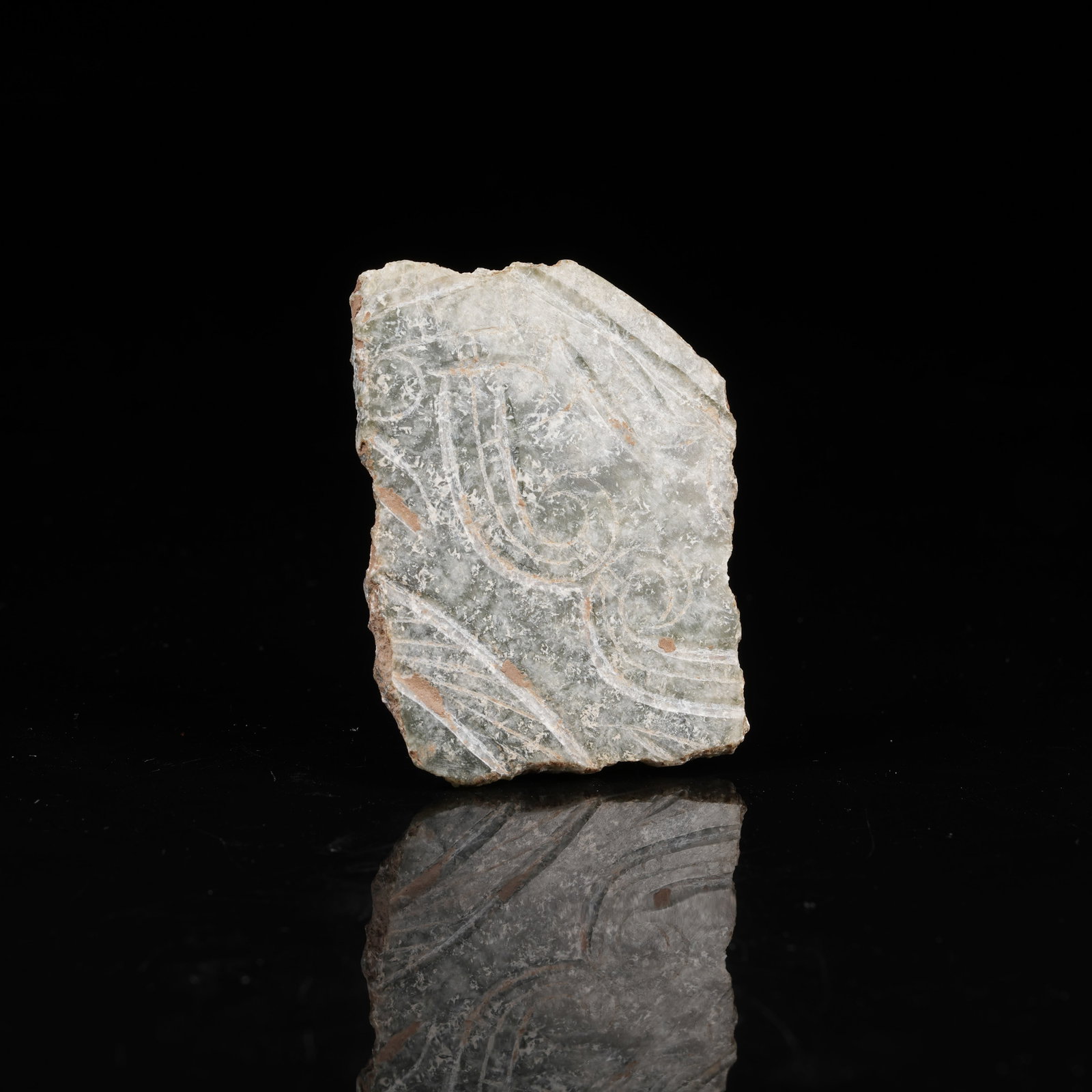 A ARCHAIC JADE SLICE: Archaic Jade Slice