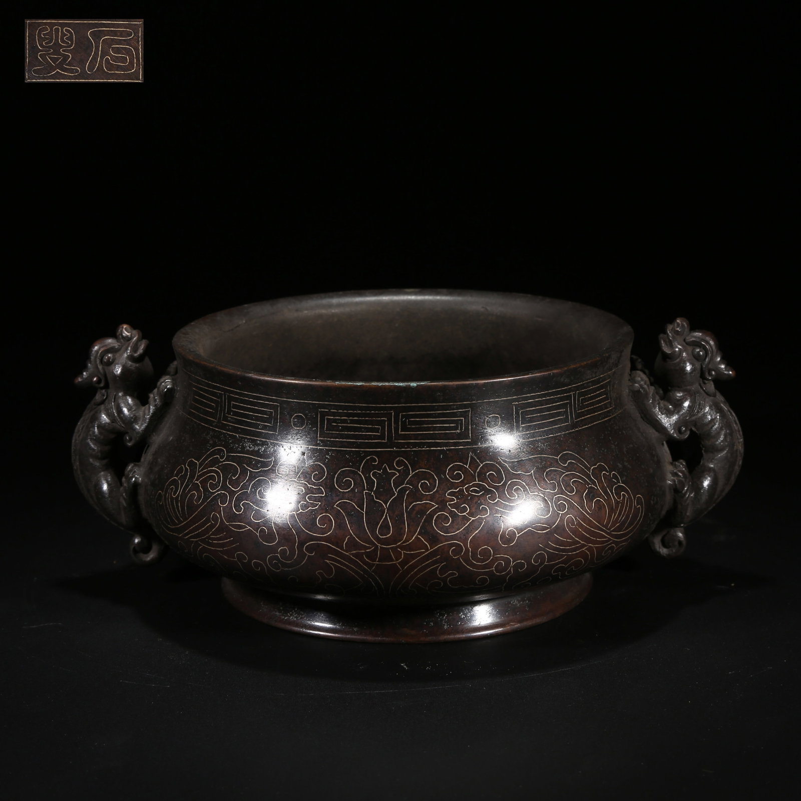 A BRONZE INLAID WITH SILVER WIRE BEAST-HANDLED CENSER: Bronze Inlaid with Silver Wire Beast-Handled Censer