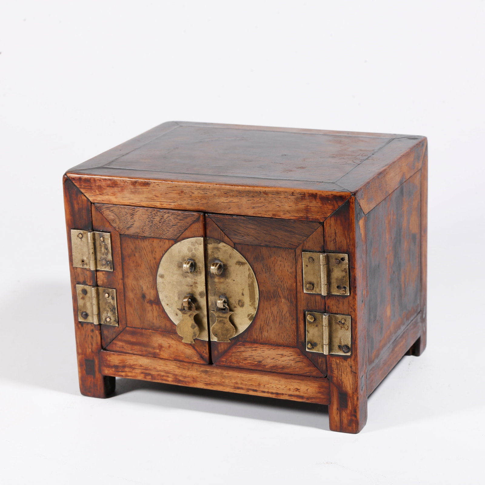 A CARVED HUANGHUALI WOOD SMALL CABINET (1 of 9)