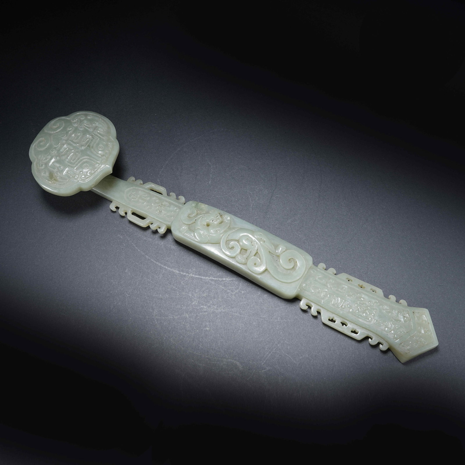 A HETIAN JADE RUYI SCEPTER WITH BEAST MASK AND CHILONG PATTERN (1 of 6)
