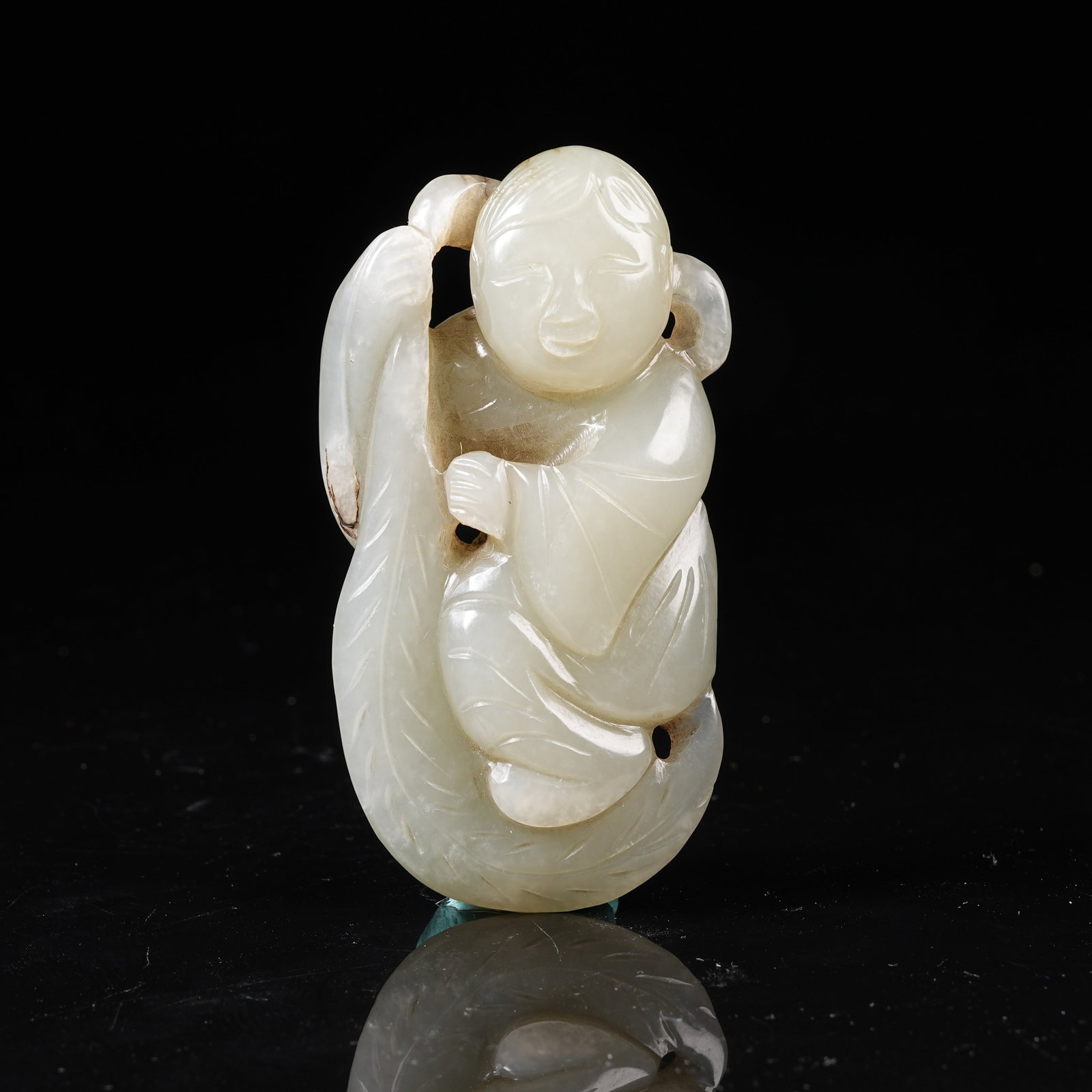 A MID-ANCIENT JADE BOY PENDANT: Mid-Ancient Jade Boy Pendant