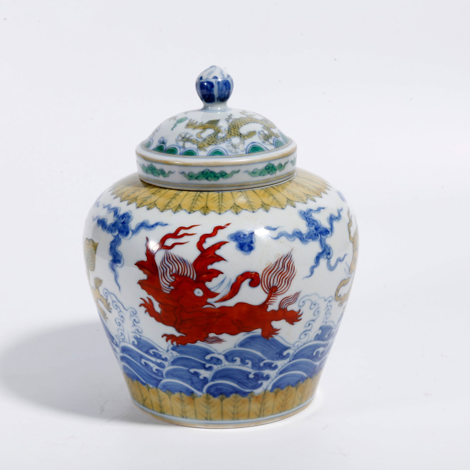 A DOUCAI LIDDED JAR WITH AUSPICIOUS BEAST PATTERN (1 of 9)