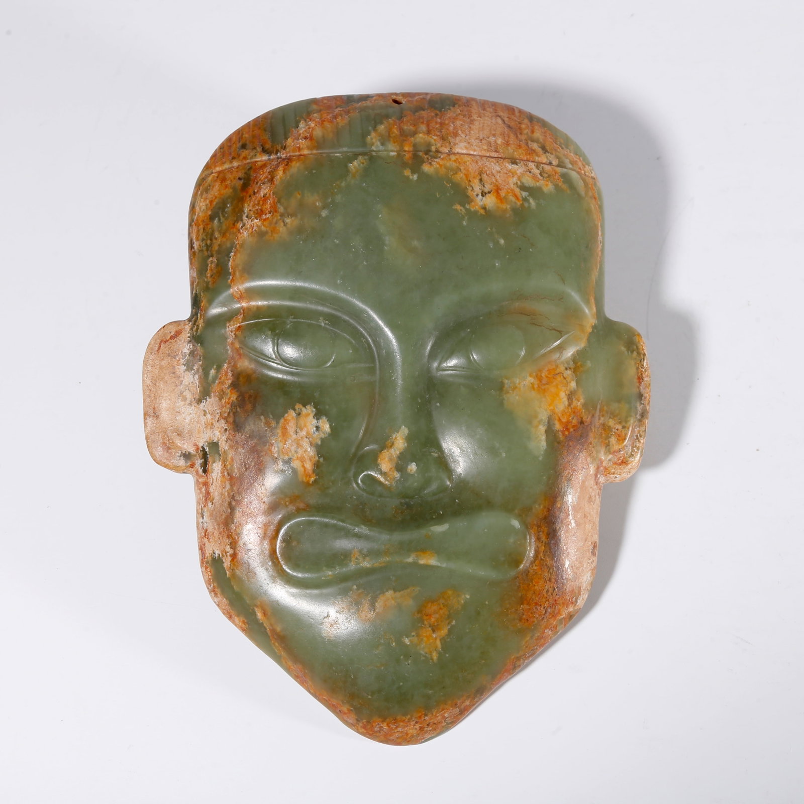 A HONGSHAN JADE MASK (1 of 10)
