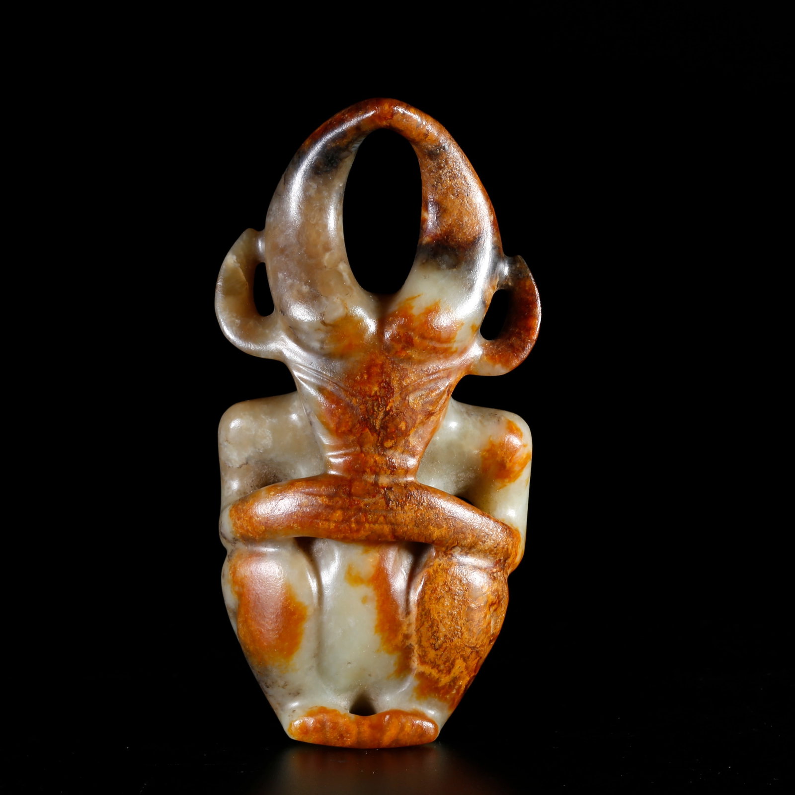 A ANCIENT JADE SUN GOD FIGURINE (1 of 9)