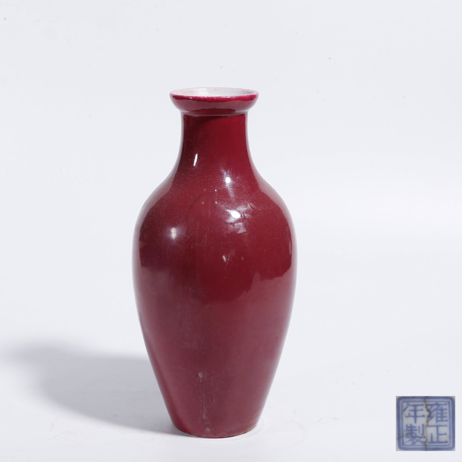 A CRIMSON GLAZE DECORATIVE VASE (1 of 9)