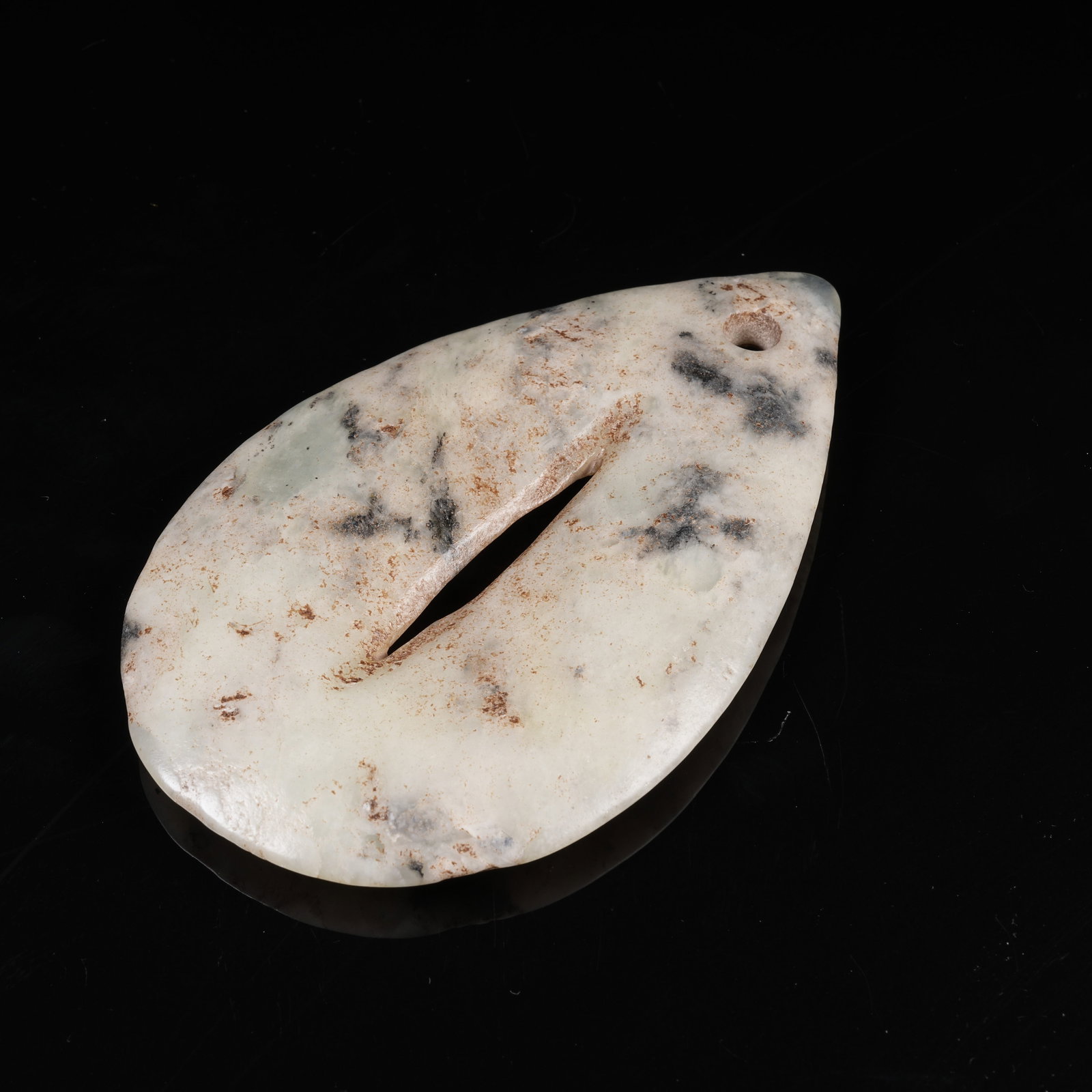 A ARCHAIC JADE TEARDROP SHAPED PENDANT: Archaic Jade Teardrop Shaped Pendant
