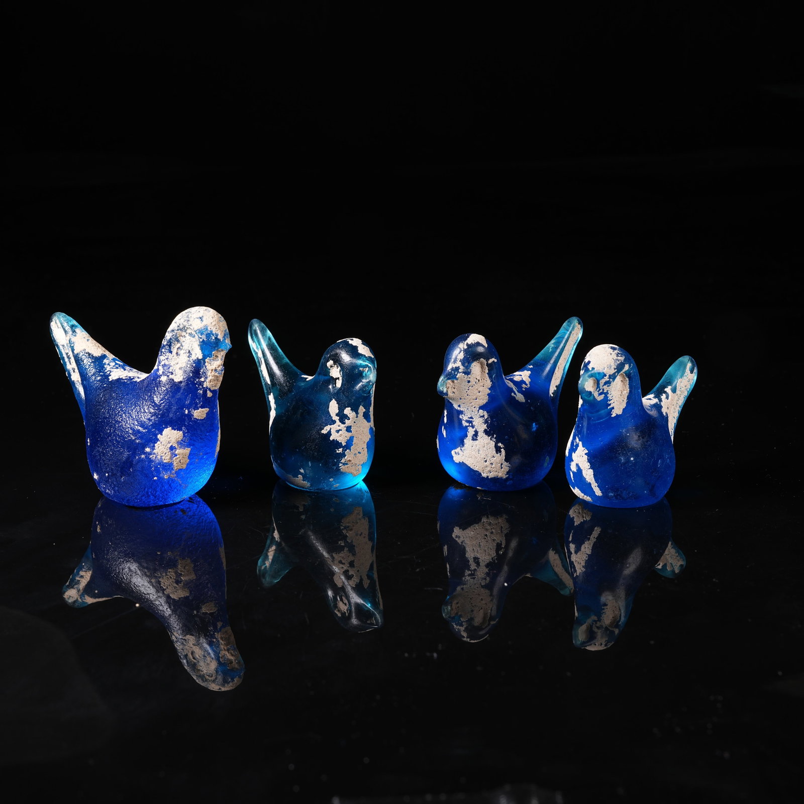 A SET OF COLORED GLAZE PHOENIX ORNAMENTS: Set of Colored Glaze Phoenix Ornaments