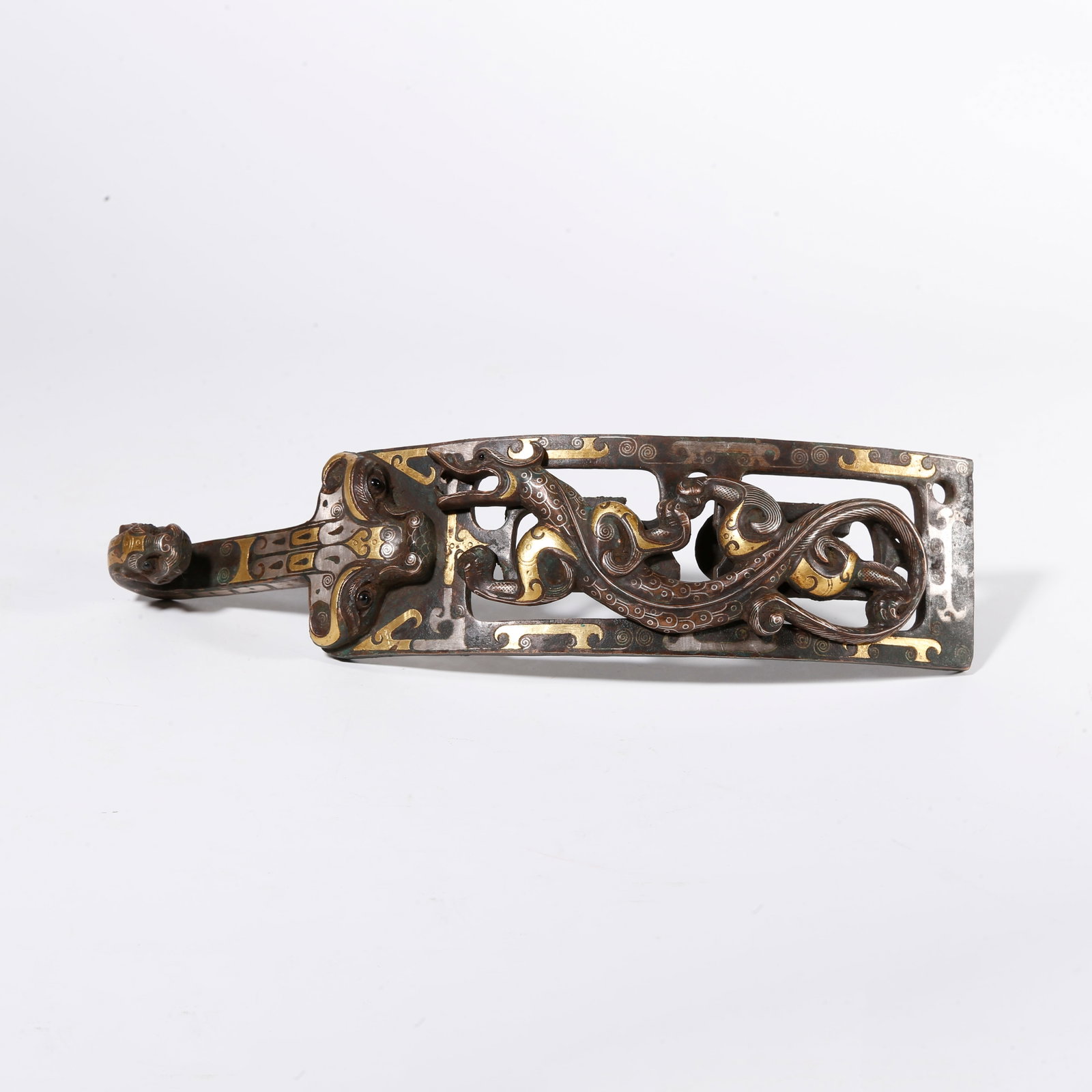A BRONZE DRAGON-SHAPED BELT HOOK WITH GOLD AND SILVER INLAY: Bronze Dragon-shaped Belt Hook with Gold and Silver Inlay