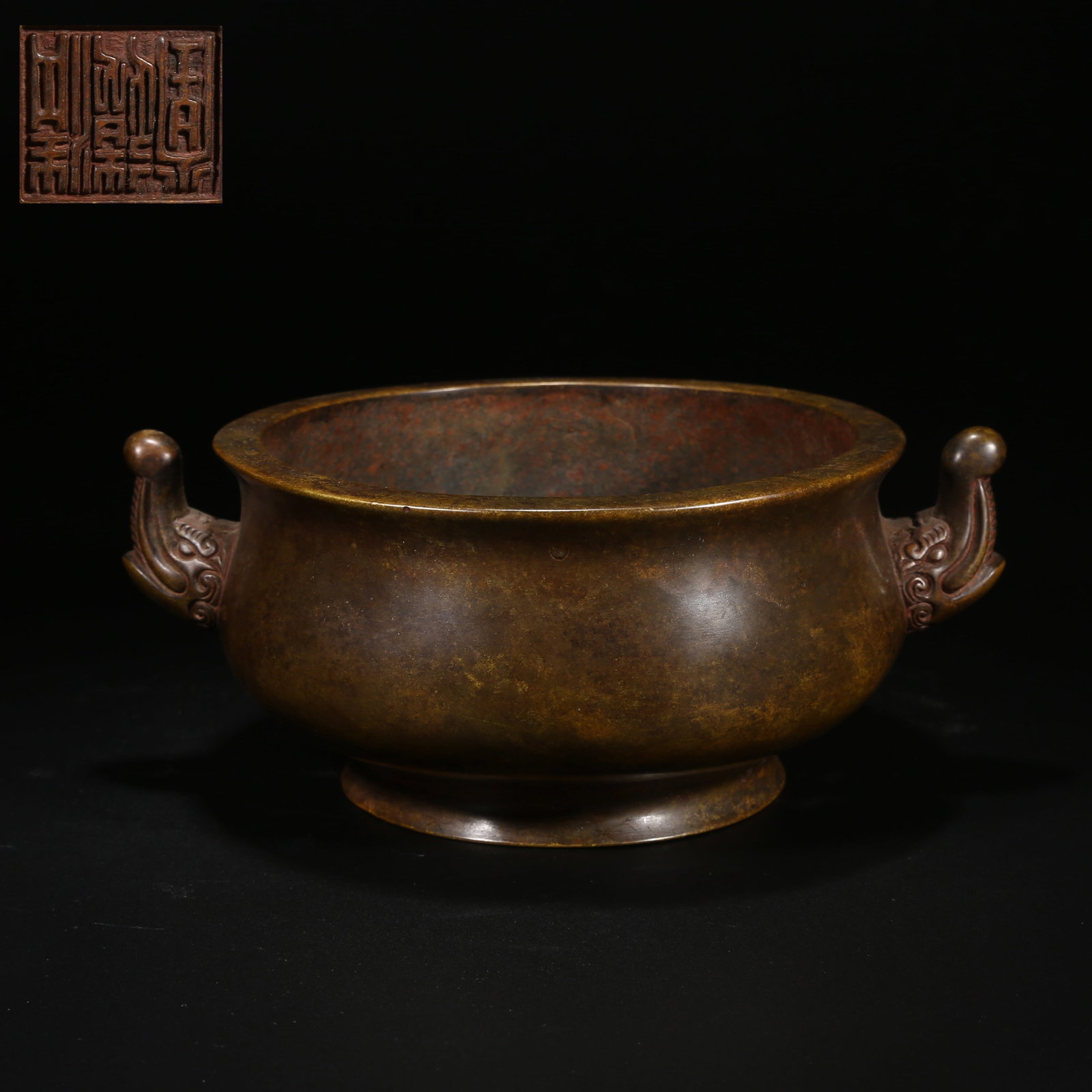 A BRONZE ELEPHANT-HANDLED CENSER: Bronze Elephant-Handled Censer