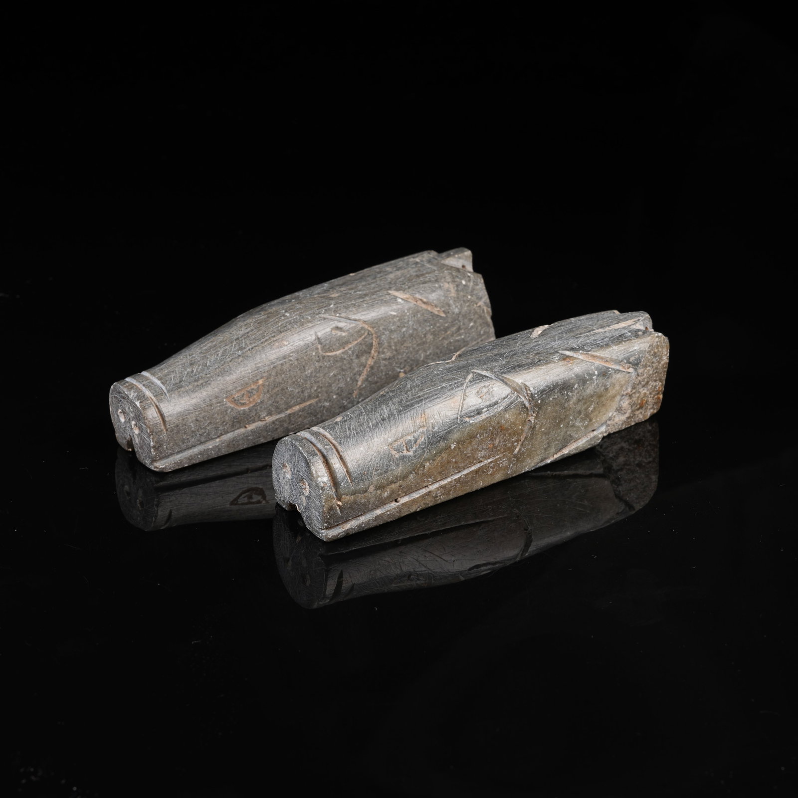 A SET OF ARCHAIC JADE HAND GRIPS: Set of Archaic Jade Hand Grips