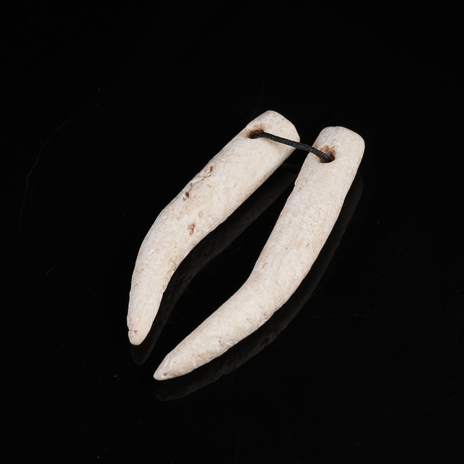 A SET OF ARCHAIC JADE PENDANTS: Set of Archaic Jade Pendants