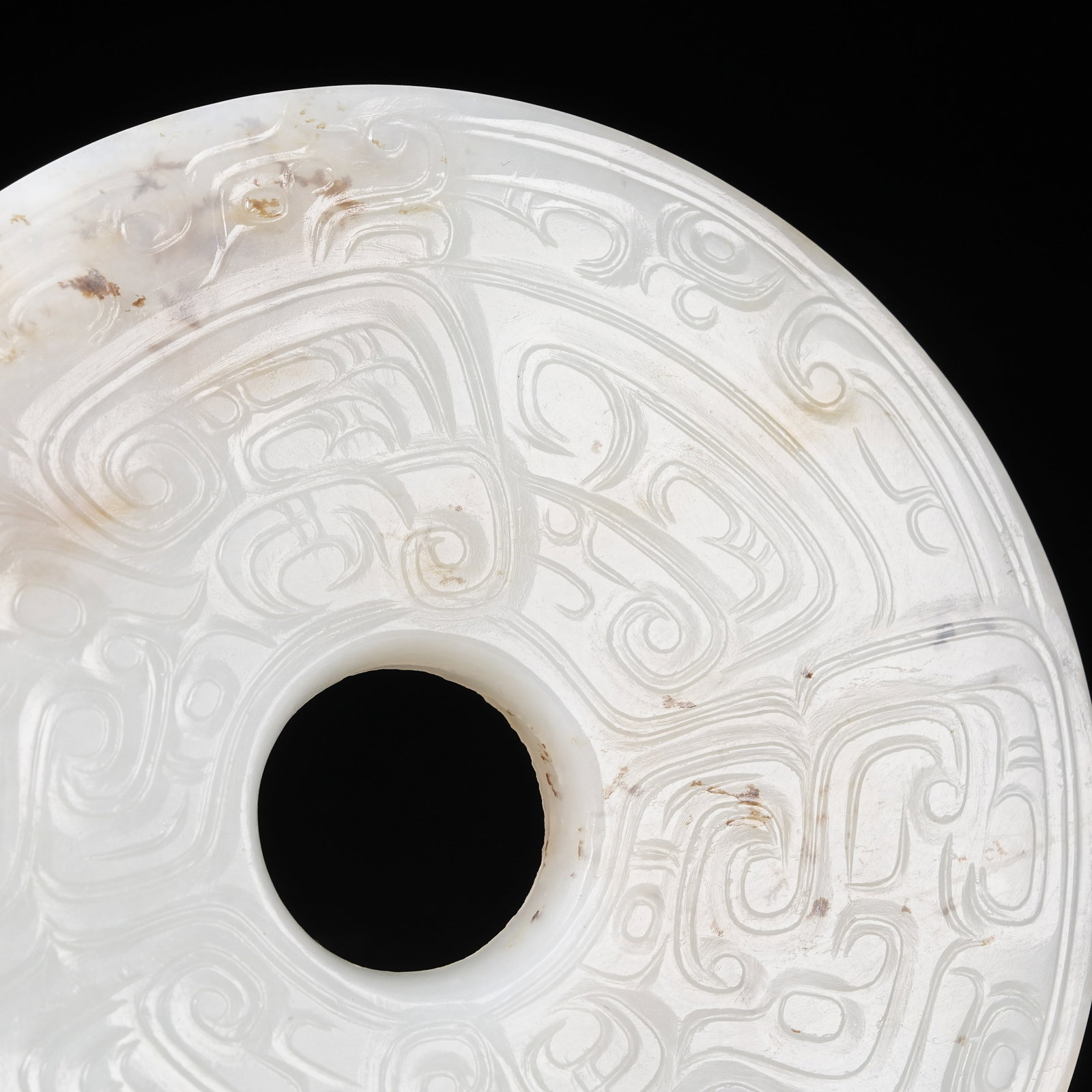A NEPHRITE BI DISC WITH PHOENIX PATTERN - 2