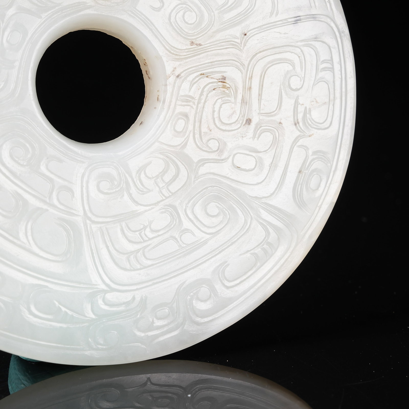 A NEPHRITE BI DISC WITH PHOENIX PATTERN - 3