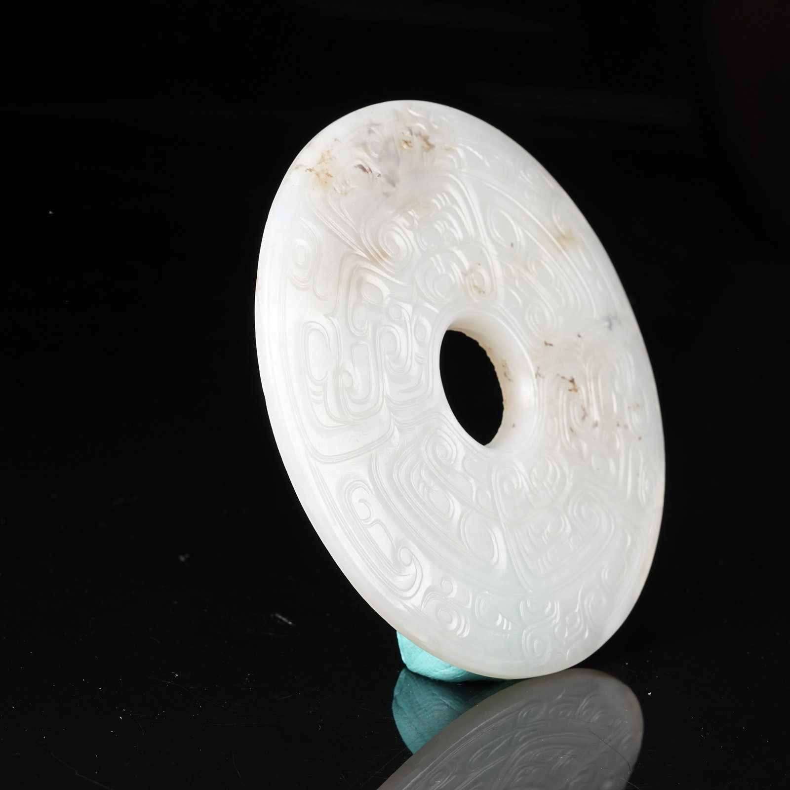 A NEPHRITE BI DISC WITH PHOENIX PATTERN - 5