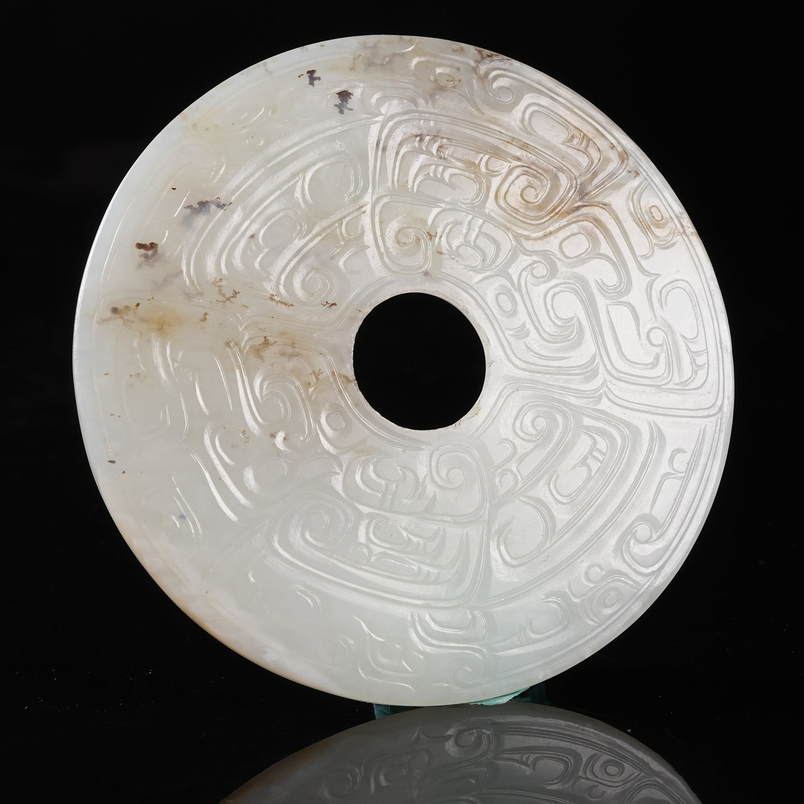 A NEPHRITE BI DISC WITH PHOENIX PATTERN - 8