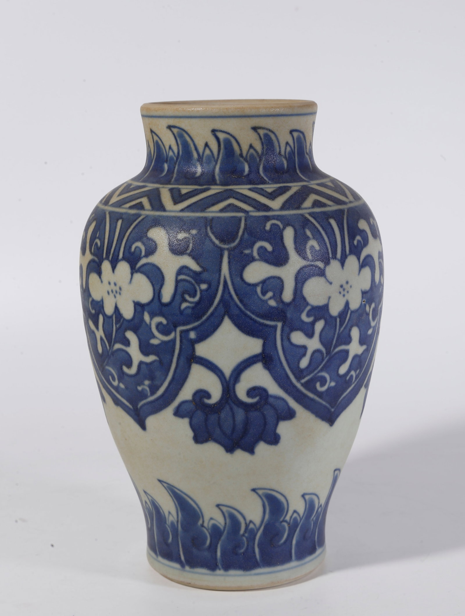 A BLUE AND WHITE APPRECIATION VASE WITH INTERLOCKING FLORAL PATTERNS: Blue and White Appreciation Vase with Interlocking Floral Patterns
