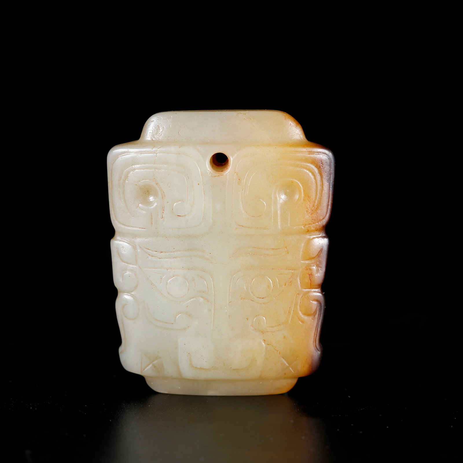 A ANCIENT JADE PENDANT WITH BEAST MASK PATTERN: Ancient Jade Pendant with Beast Mask Pattern