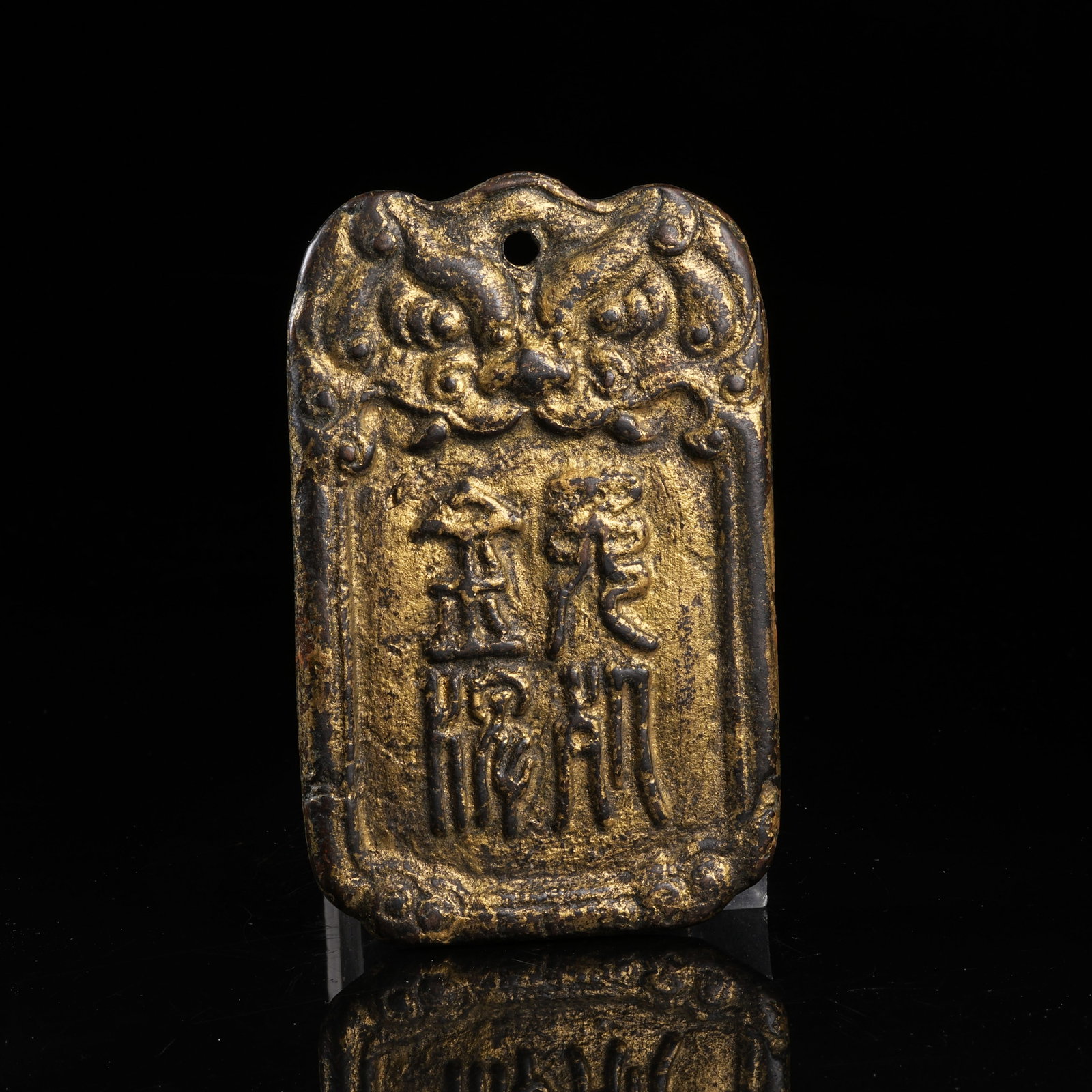 A GILT BRONZE TOKEN (1 of 8)