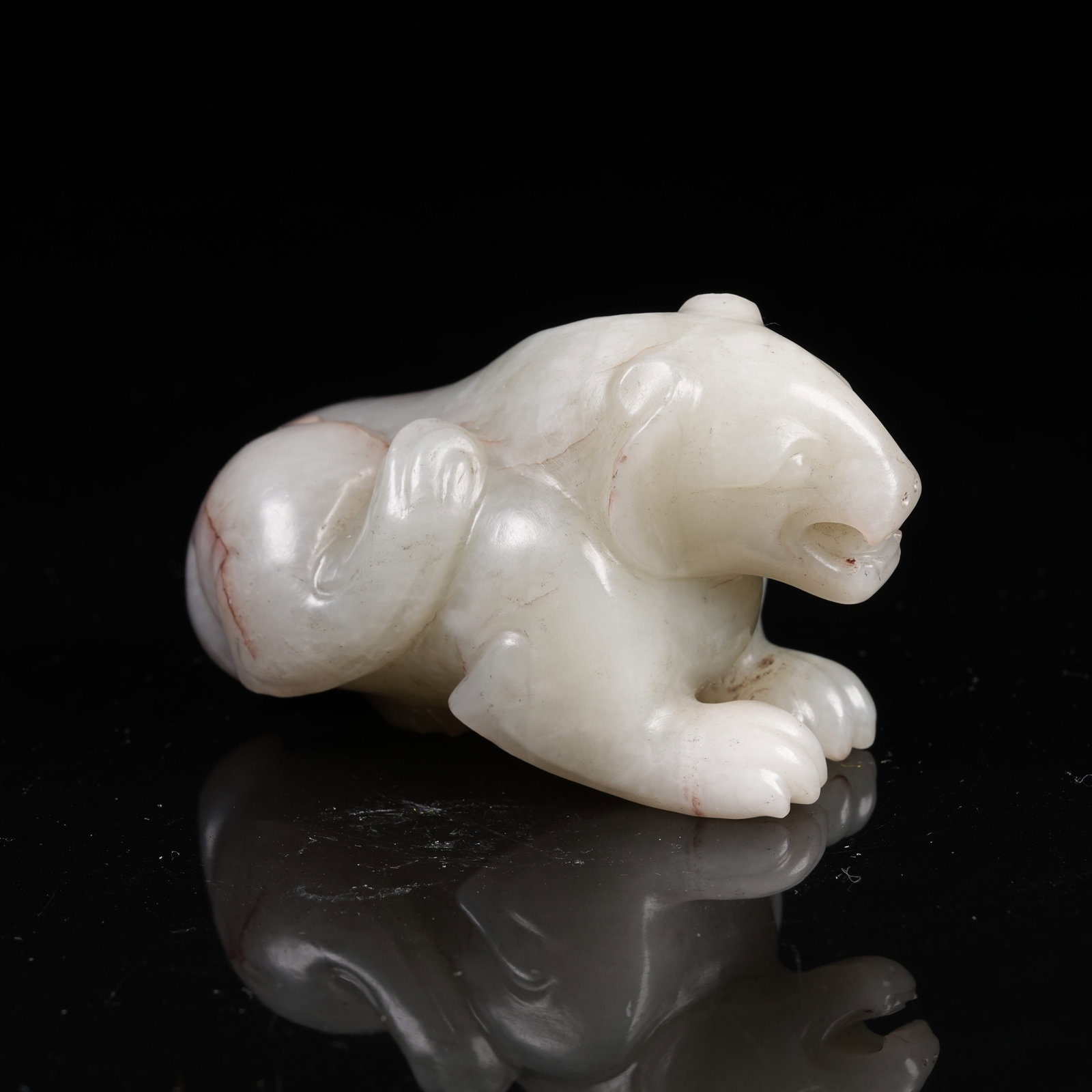 A ARCHAIC JADE RECUMBENT TIGER ORNAMENT: Archaic Jade Recumbent Tiger Ornament