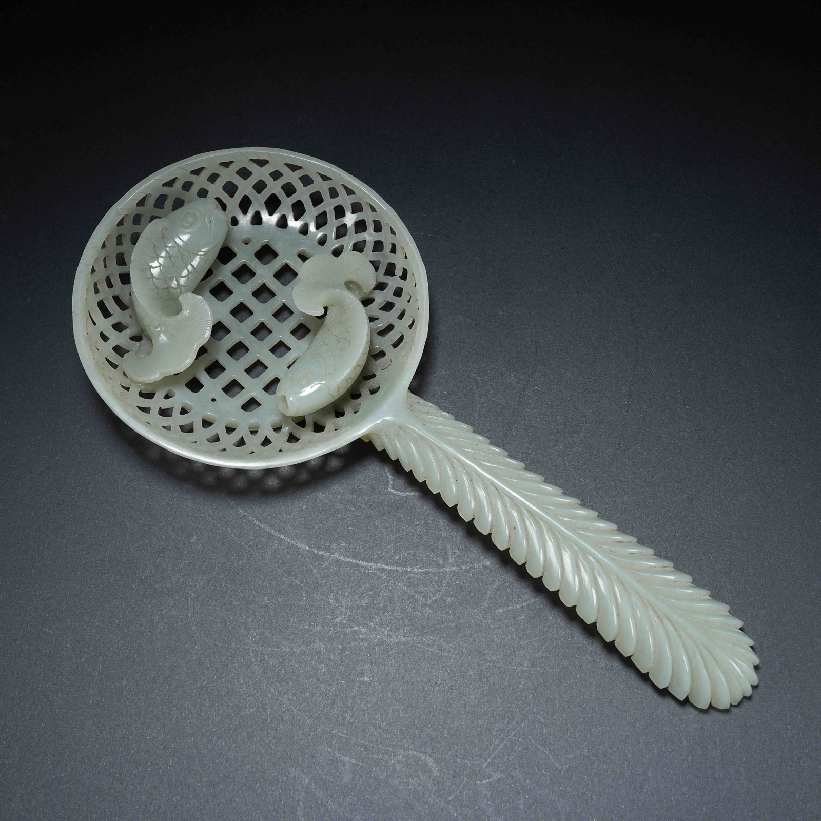 A HETIAN JADE OPENWORK DOUBLE FISH SPOON: Hetian Jade Openwork Double Fish Spoon