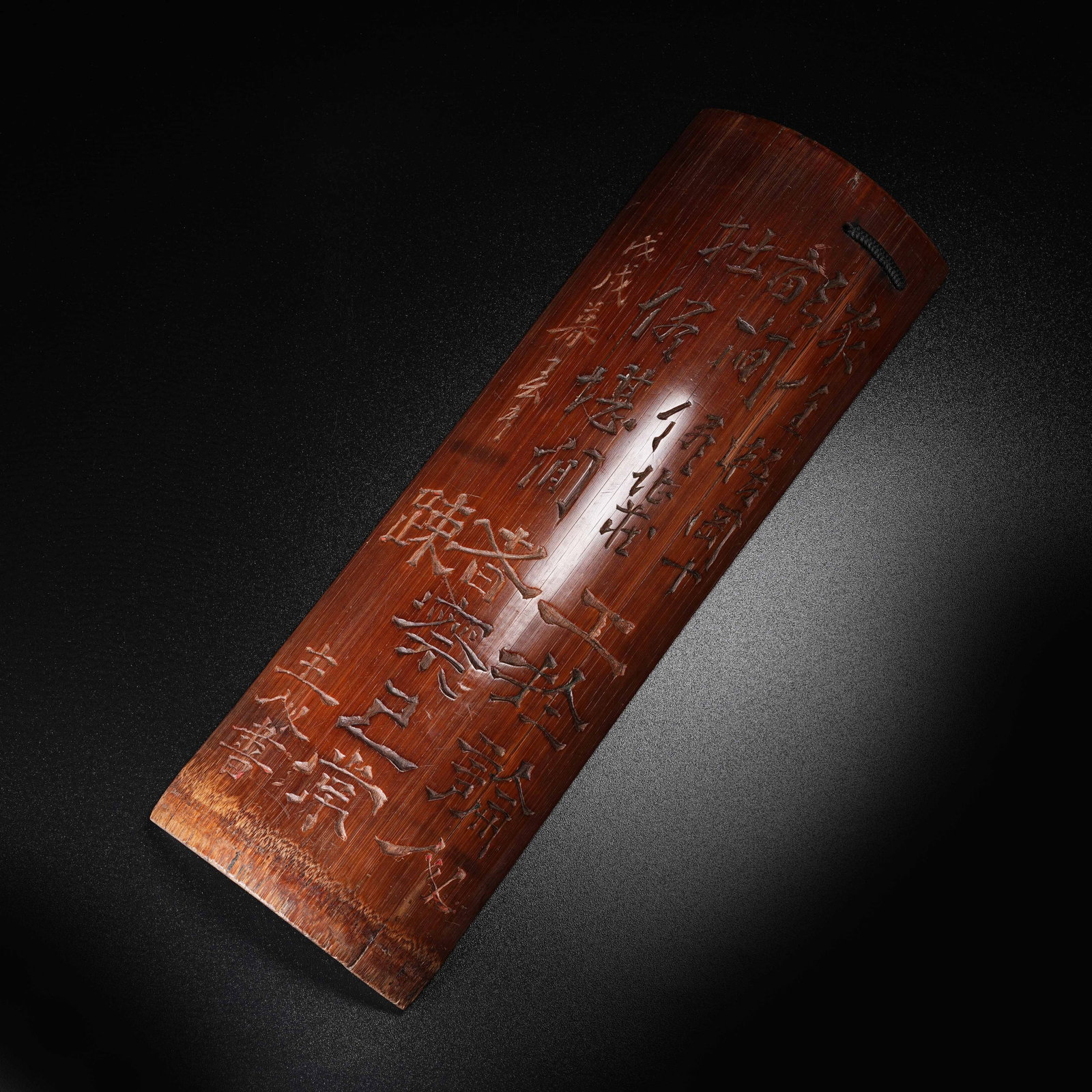 A BAMBOO CARVED INSCRIBED WRIST REST: Bamboo Carved Inscribed Wrist Rest