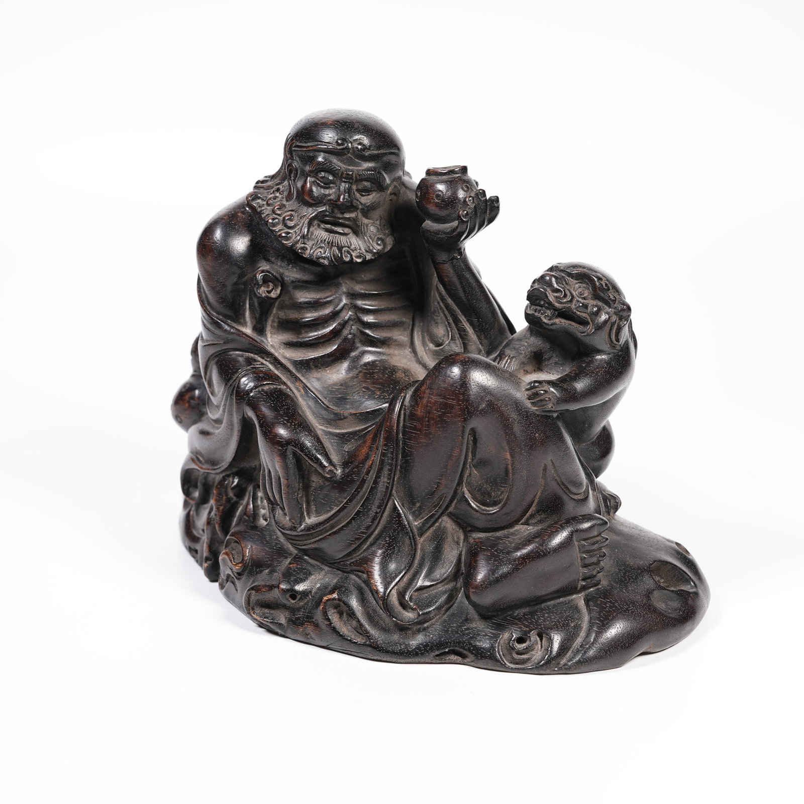 A RED SANDALWOOD EMACIATED ARHAT ORNAMENT: Red Sandalwood Emaciated Arhat Ornament