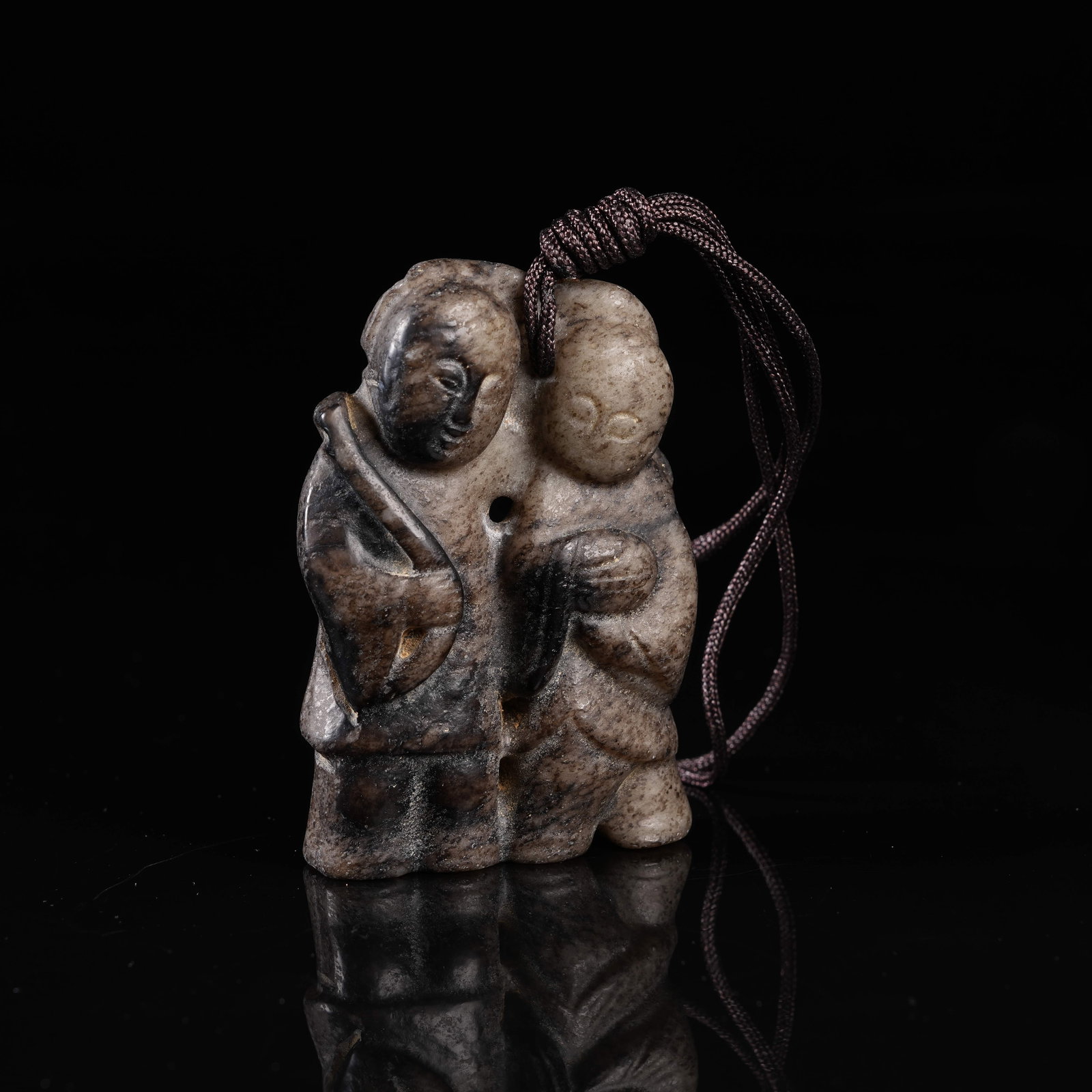 A MID-ANCIENT JADE ORNAMENT OF TWO IMMORTALS HE-HE: Mid-Ancient Jade Ornament of Two Immortals He-He