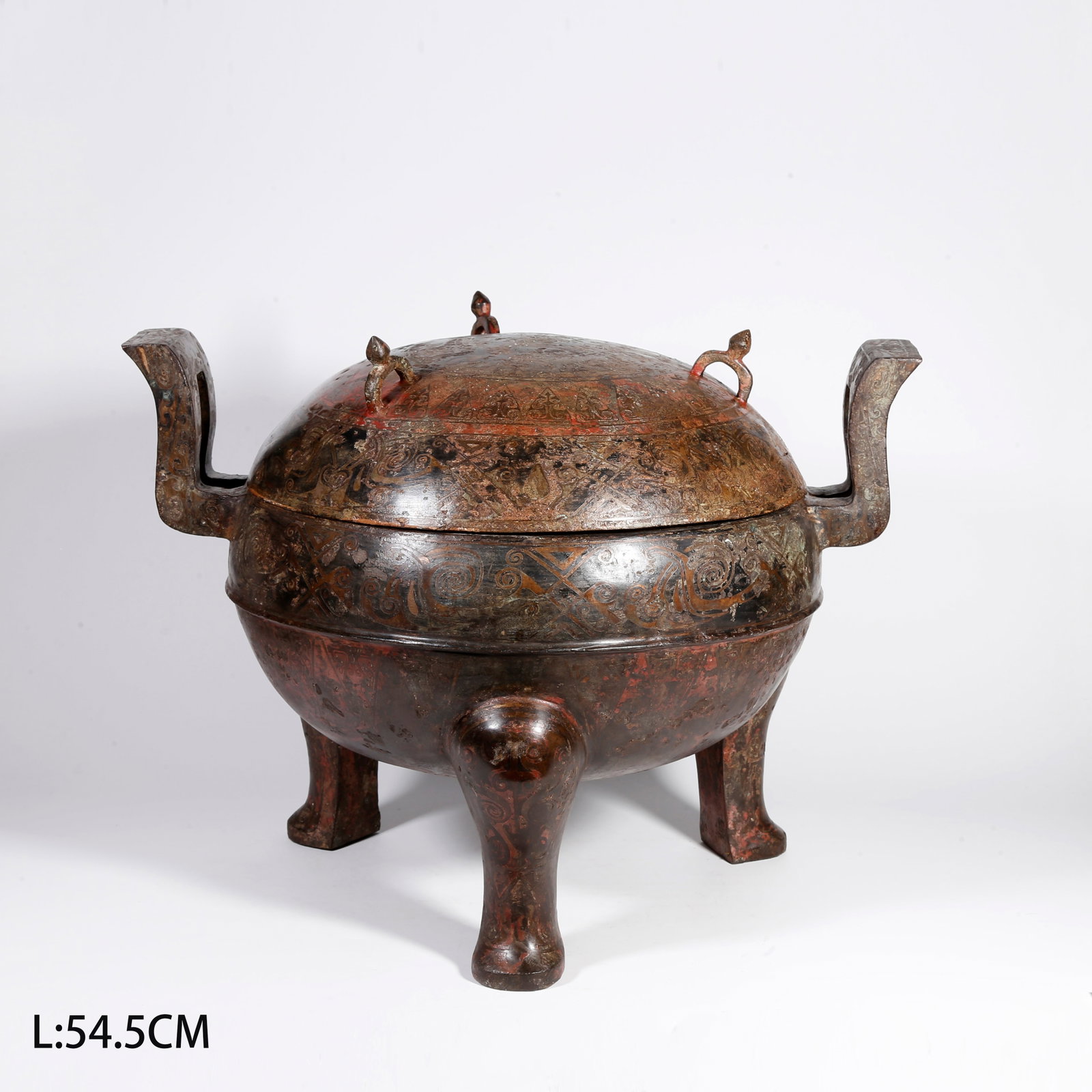 A BRONZE TRIPOD DING WITH GOLD AND SILVER INLAY: Bronze Tripod Ding with Gold and Silver Inlay
