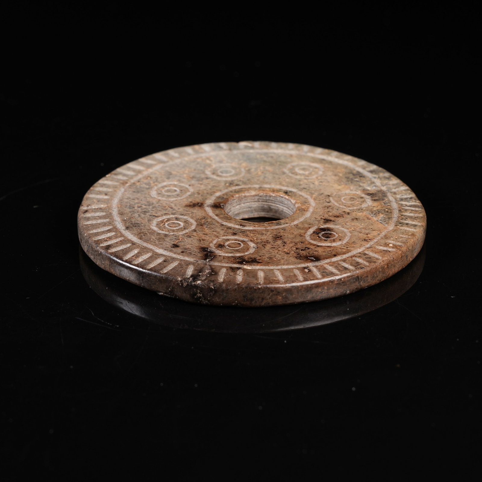 A ARCHAIC JADE BI DISC - 6