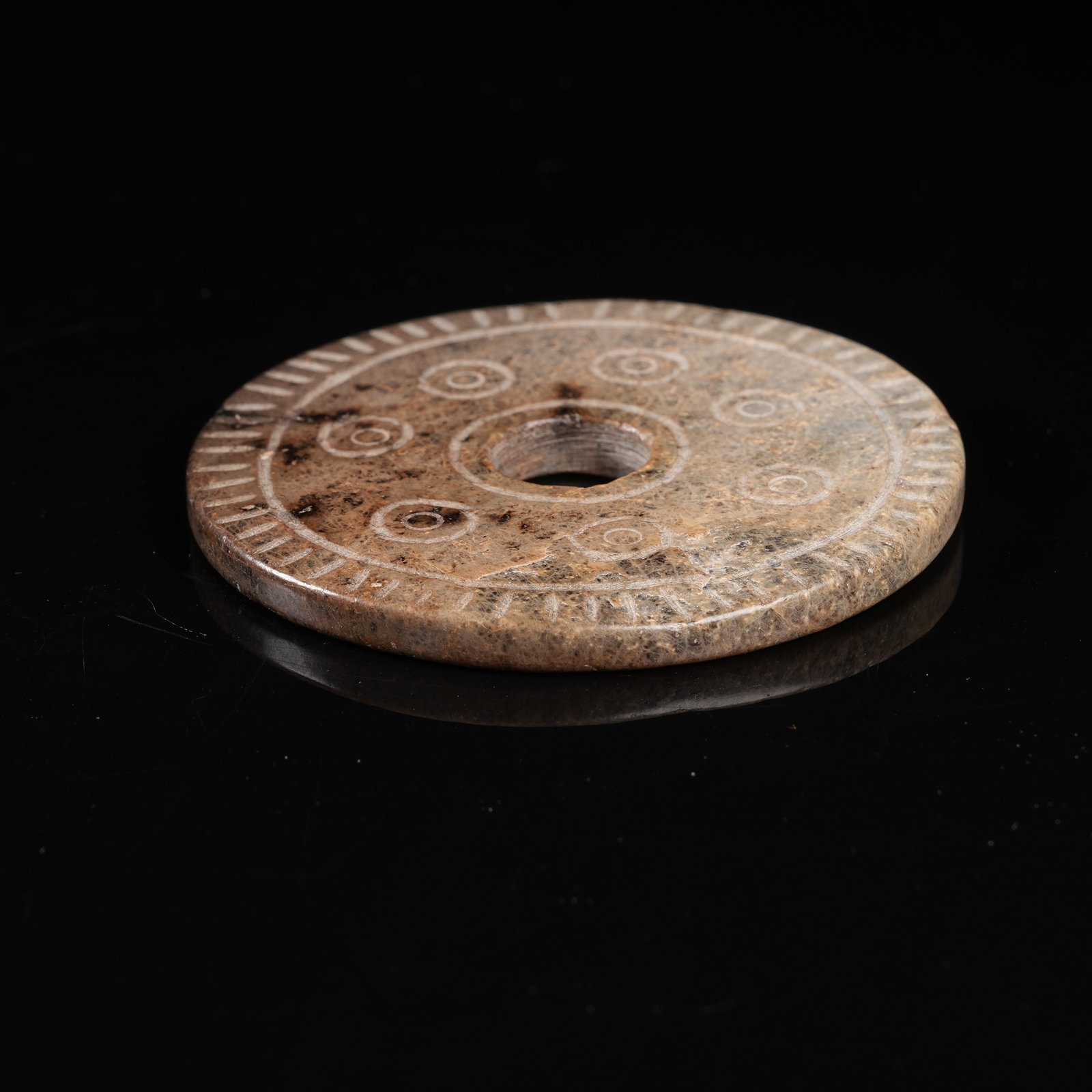A ARCHAIC JADE BI DISC - 7