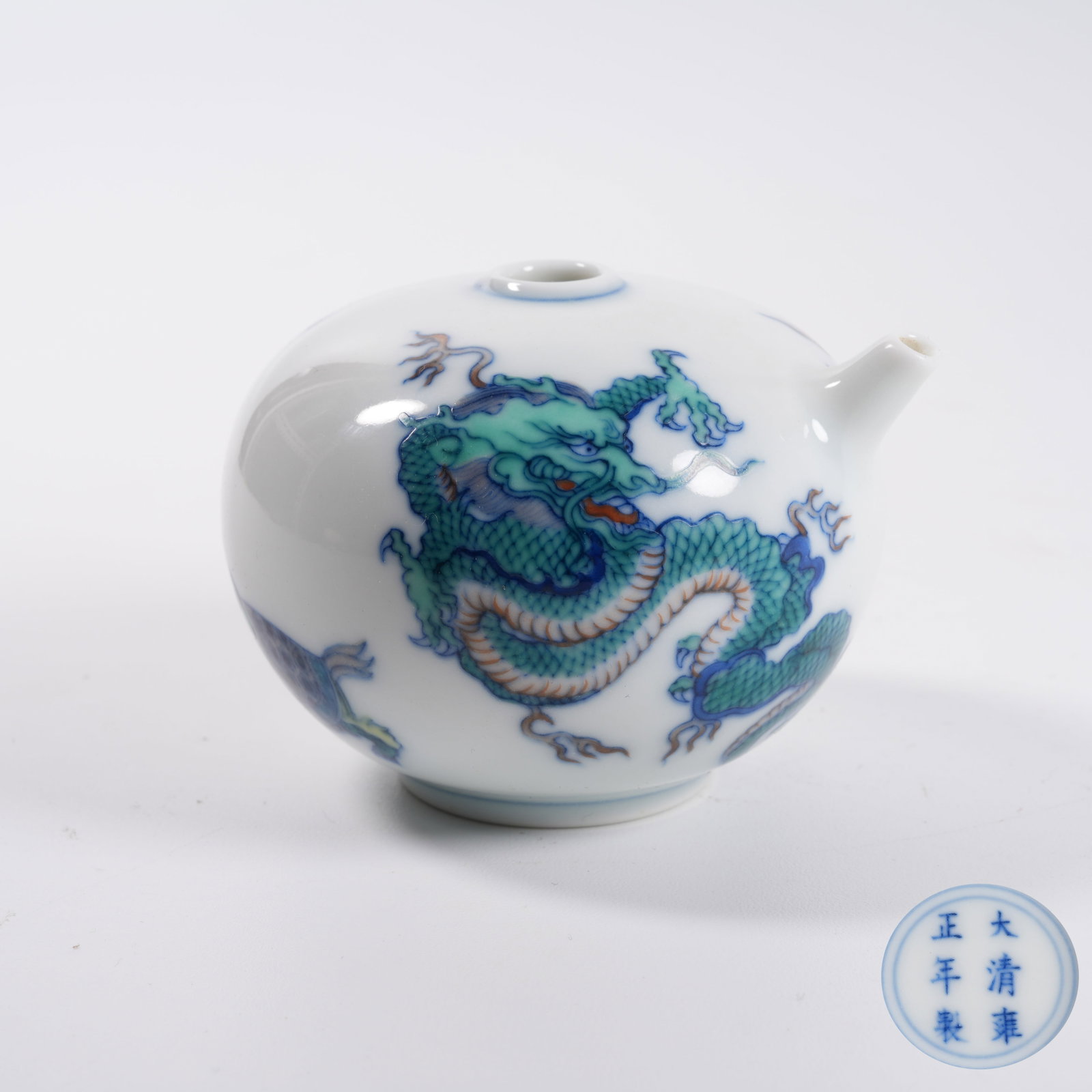 A DOUCAI WATER DROPPER WITH FOUR DIVINE BEASTS PATTERN: Doucai Water Dropper with Four Divine Beasts Pattern