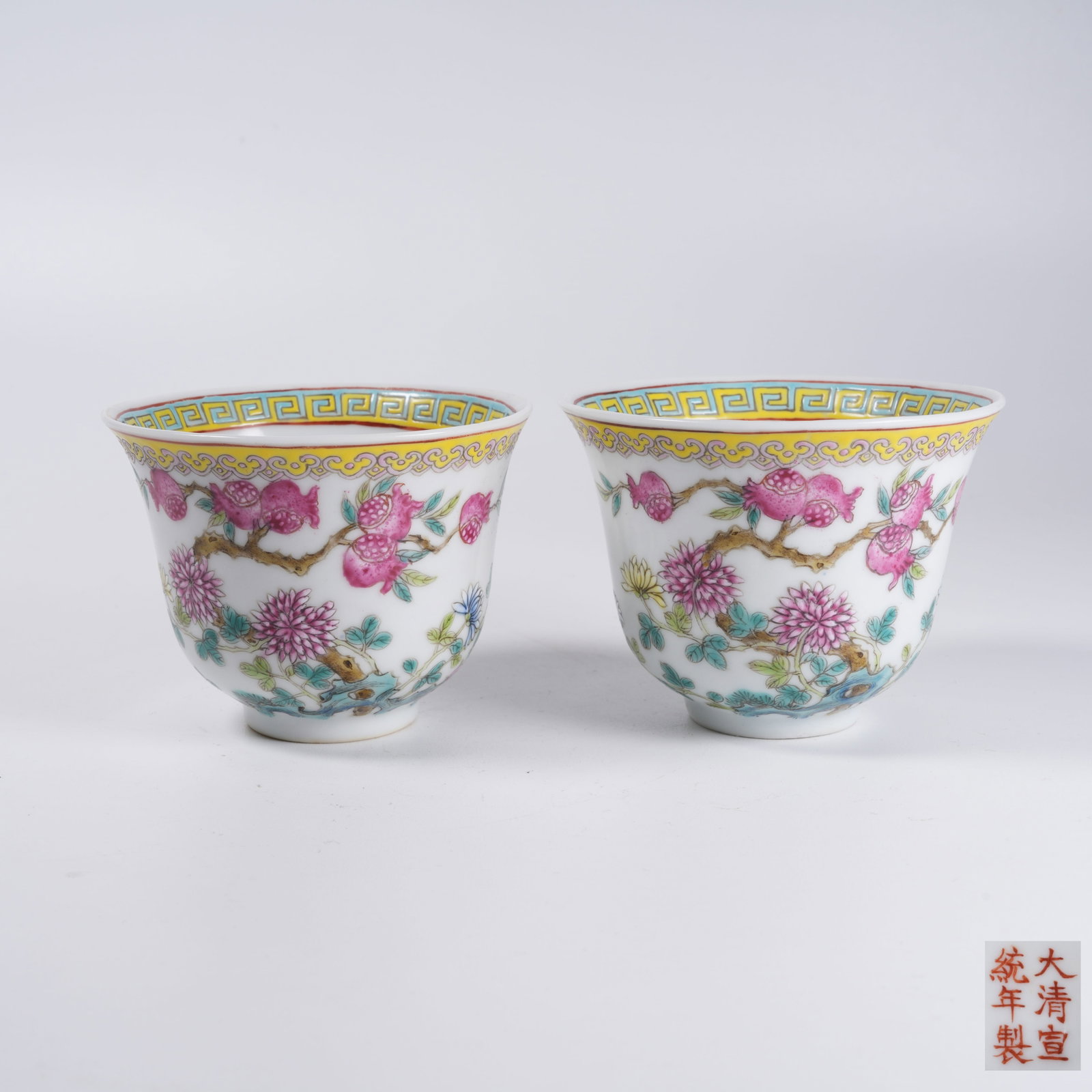 A SET OF FAMILLE ROSE CUPS WITH FLORAL AND AUSPICIOUS FRUIT PATTERNS: Set of Famille Rose Cups with Floral and Auspicious Fruit Patterns