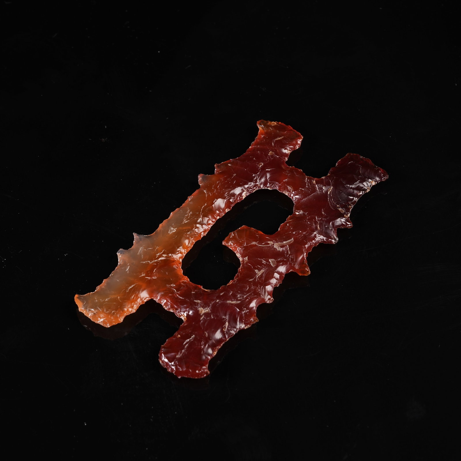 A AGATE PENDANT WITH INTERLOCKING CLOUD MOTIF: Agate Pendant with Interlocking Cloud Motif