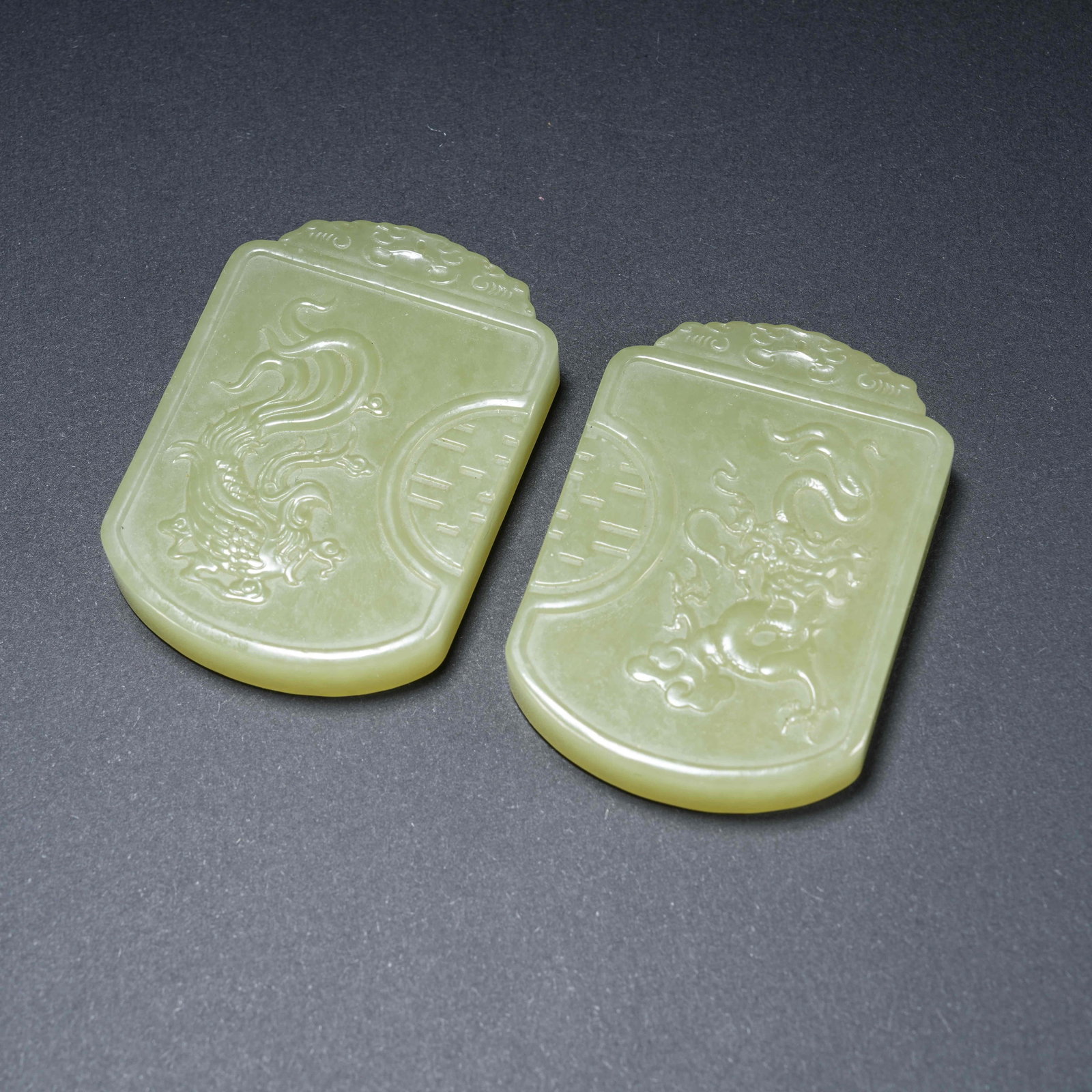 A SET OF HETIAN TOPAZ DRAGON AND PHOENIX PAIR PLAQUES (1 of 10)