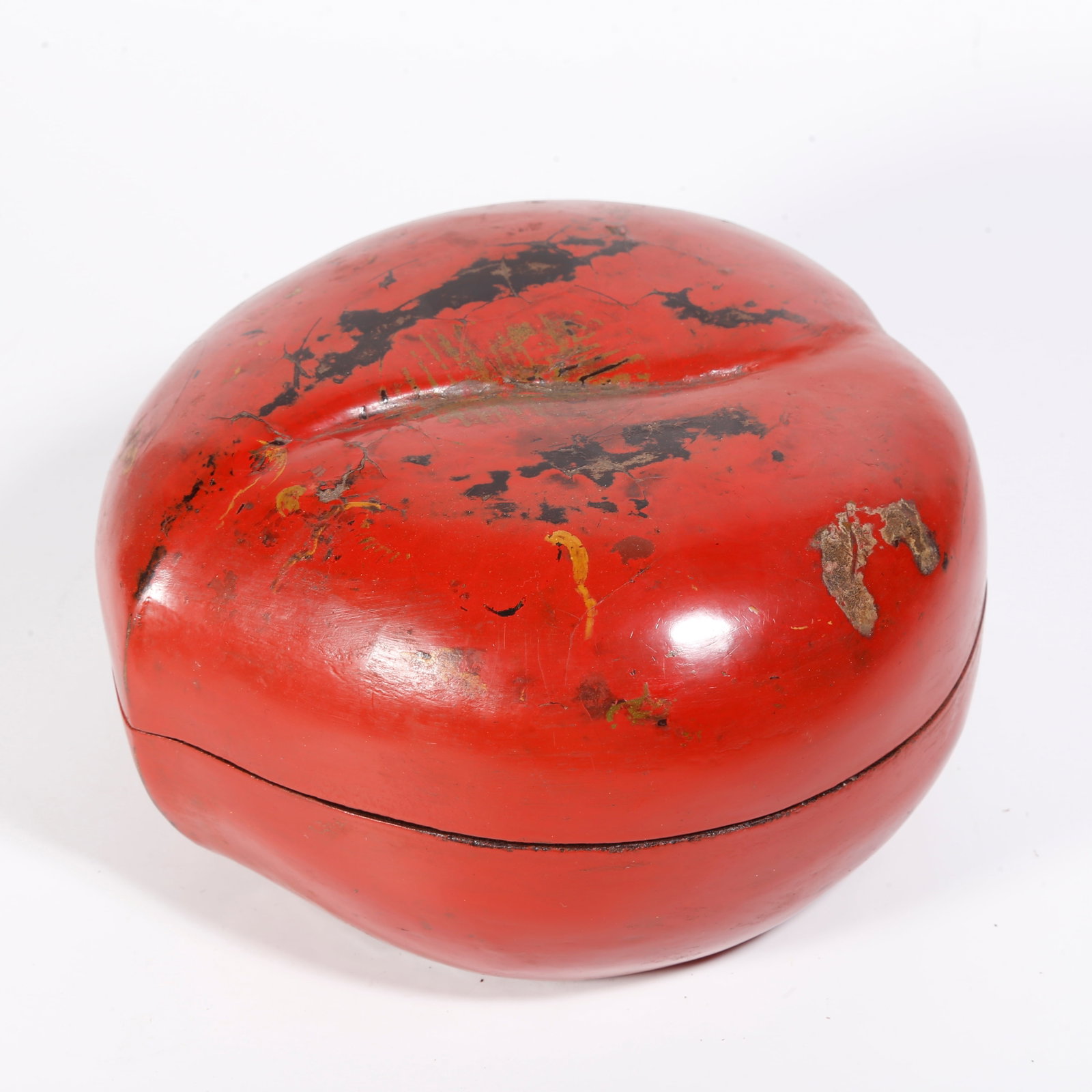 A PEACH-SHAPED CARVED LACQUER BOX WITH FORTUNE AND LONGEVITY PATTERN: Peach-shaped Carved Lacquer Box with Fortune and Longevity Pattern