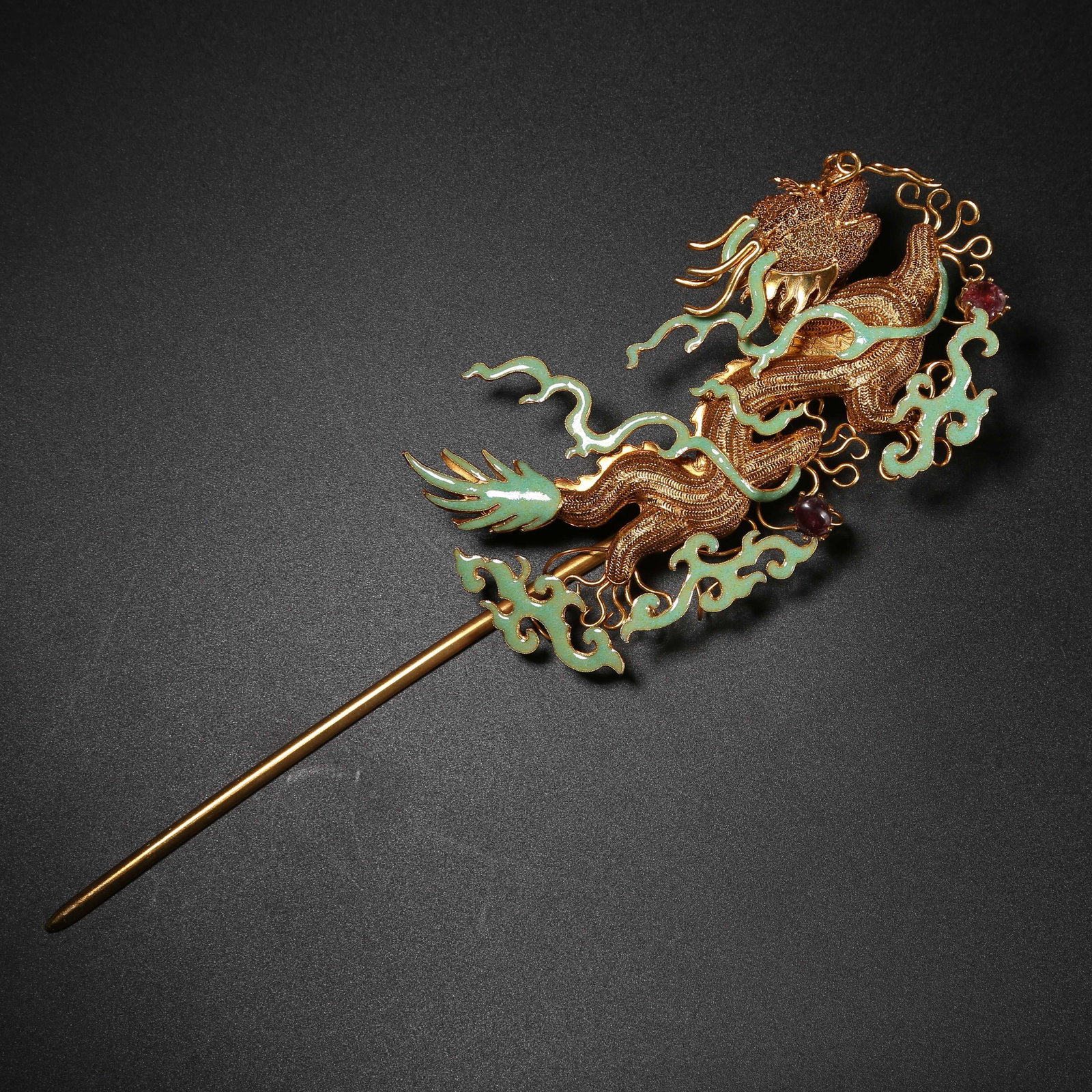 A SILVER GILT, FIRE-BLUE HAIRPIN WITH CLOUD AND DRAGON MOTIF: Silver Gilt, Fire-Blue Hairpin with Cloud and Dragon Motif